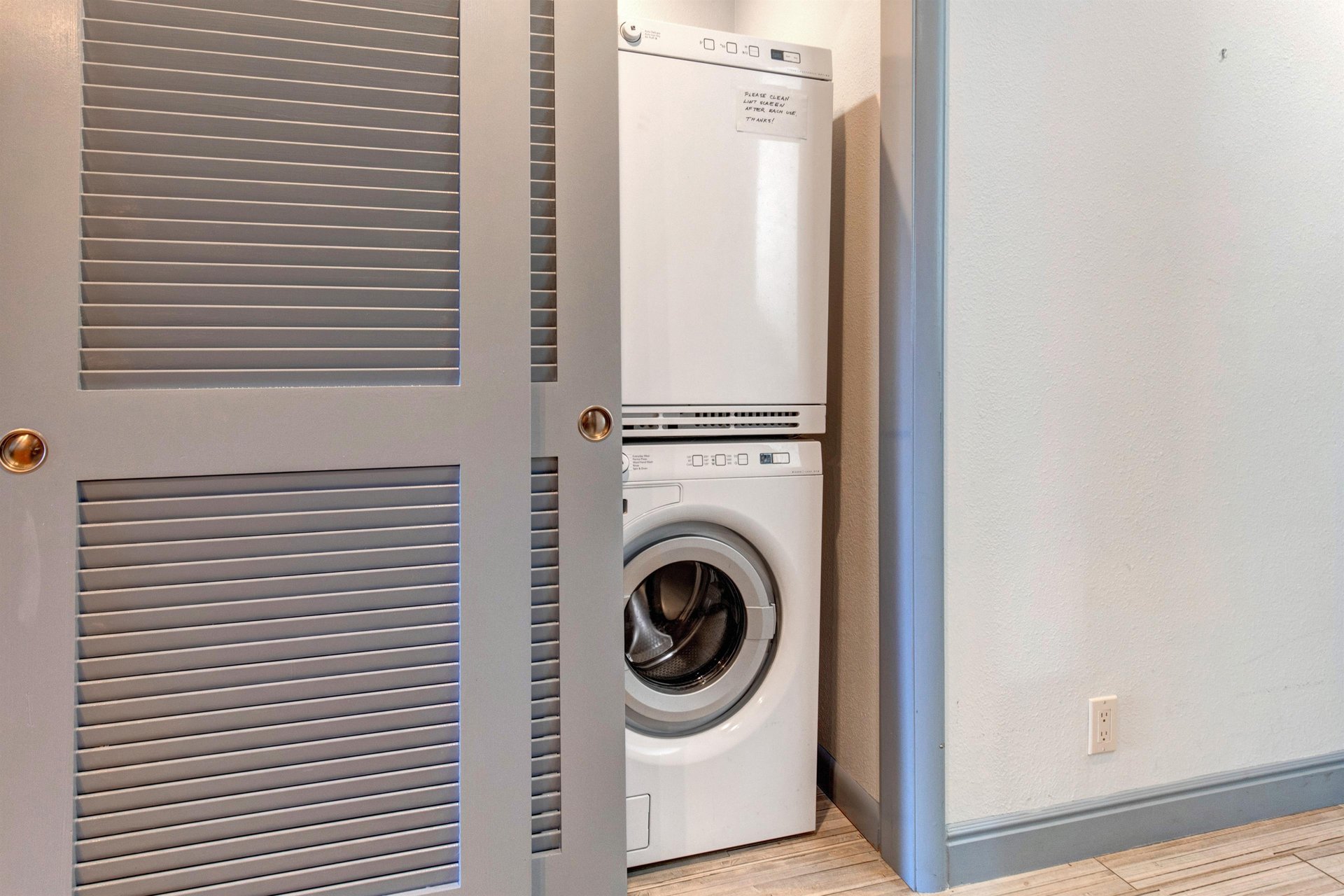 A private stackable washer and dryer.