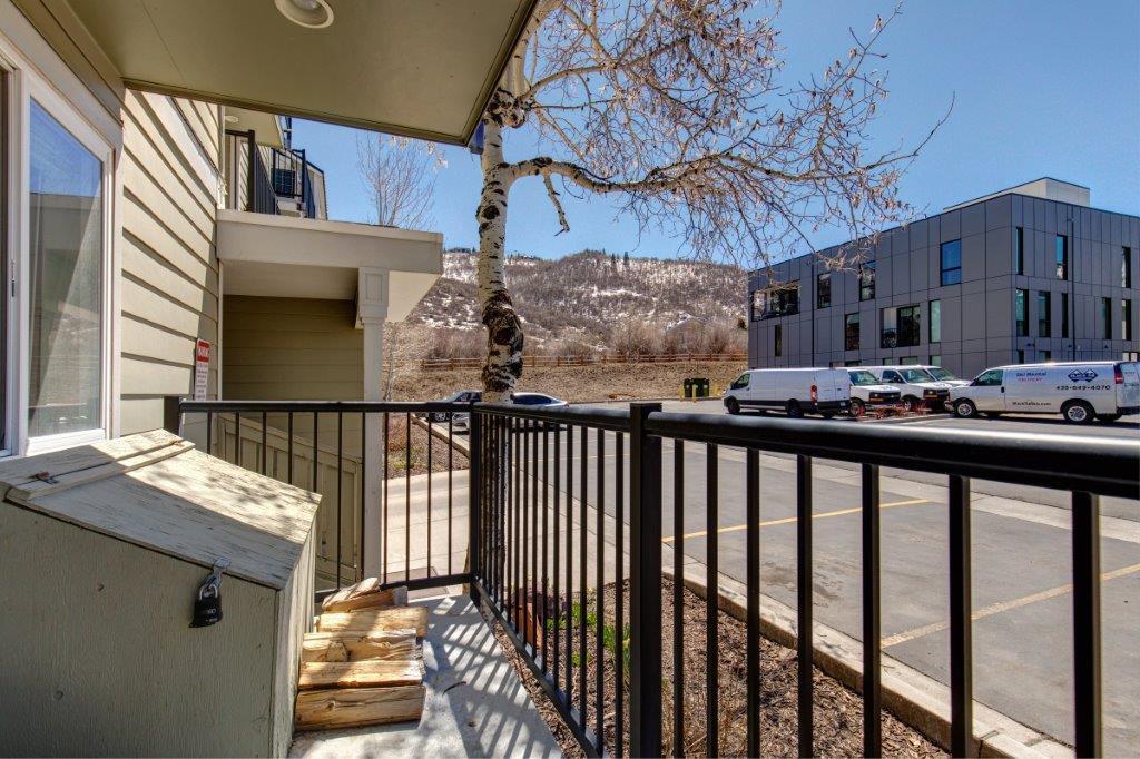 The private patio has views of the mountain and the rail trail.