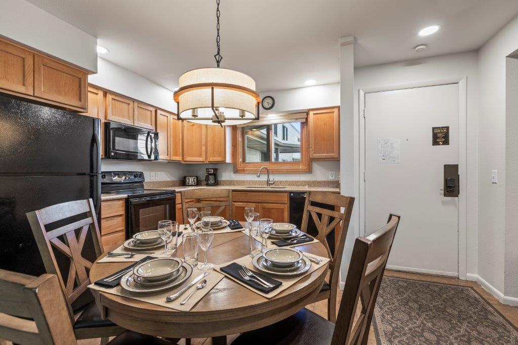 Snow Flower 79 offers an open concept kitchen with a dining area with seating for five guests.