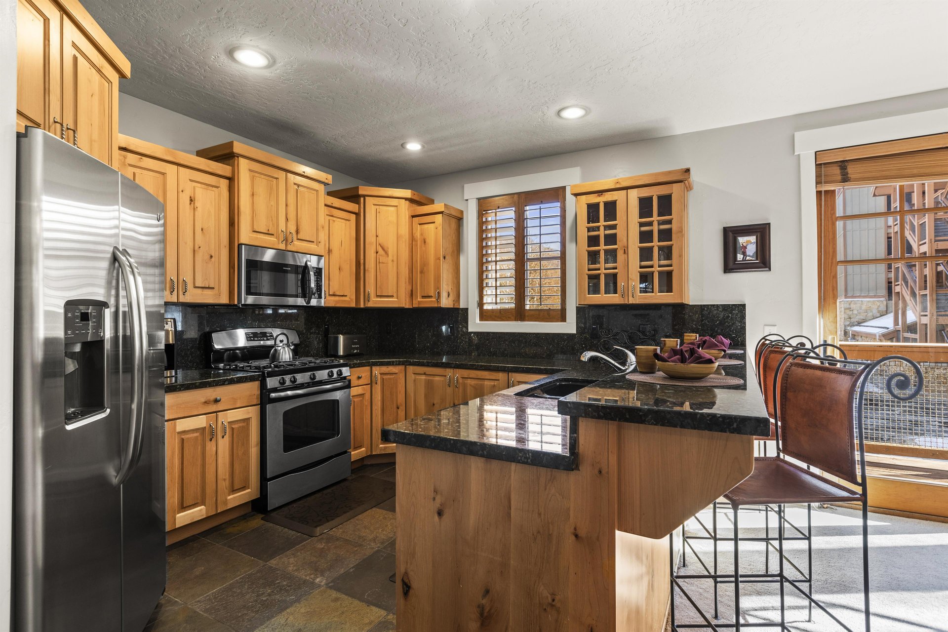 Town Pointe C101 has a wellequipped kitchen with a breakfast bar.