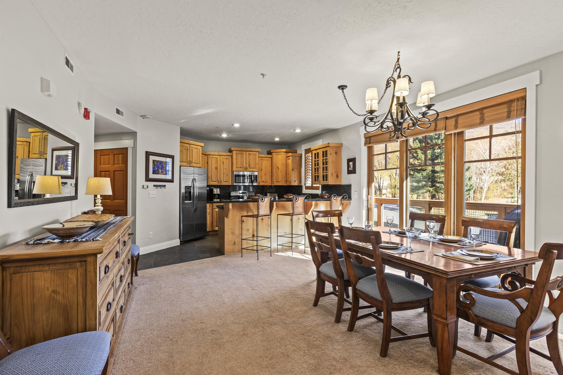 Town Pointe C101 has an open floor plan and a dining table with seating for 68 guests.