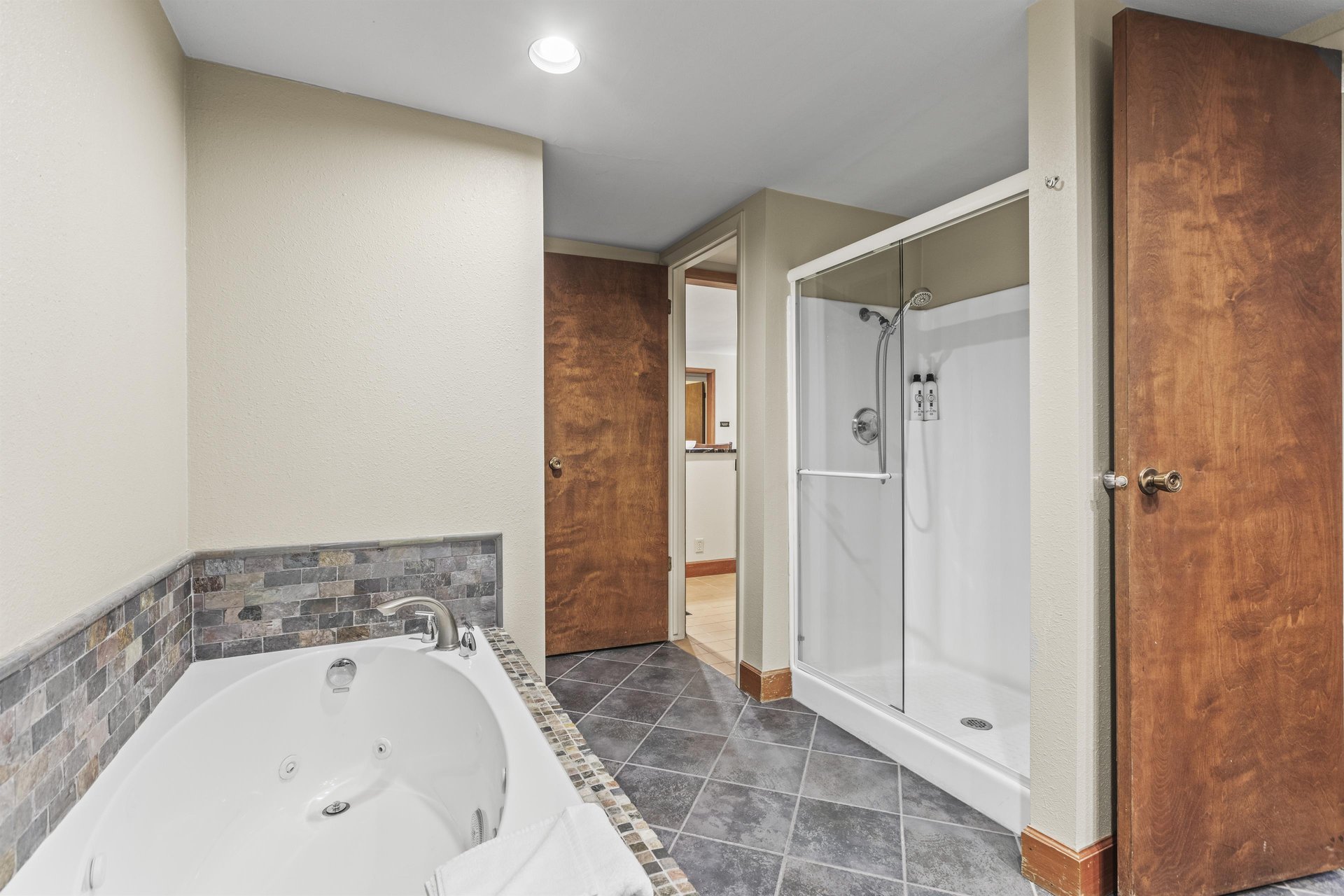 The main bedrooms en suite bathroom with deep soaker tub and walkin shower.
