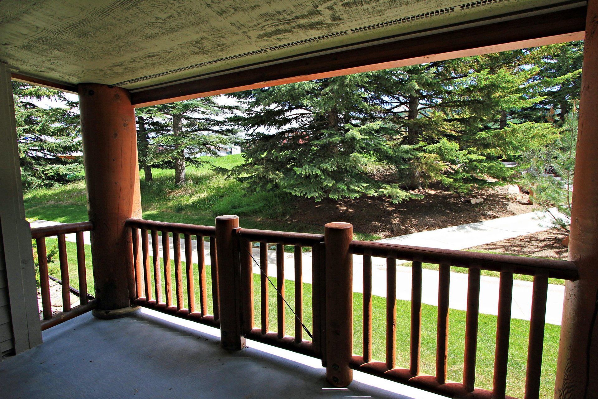 Private patio with views of the slopes during summer.