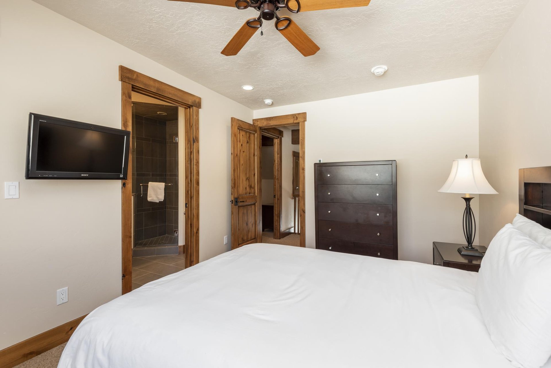Queensized bed in the third bedroom