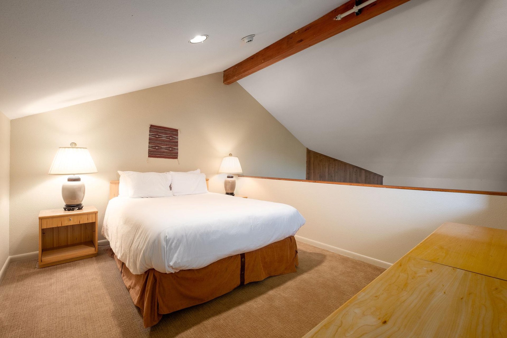 The open loft has additional sleeping on the comfortable queensized bed