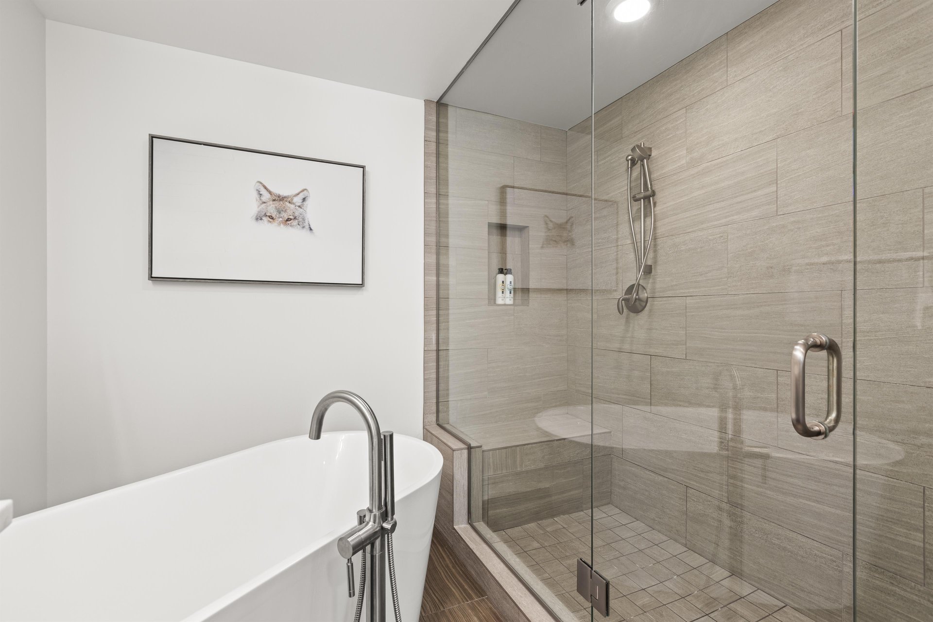 The en suite bathroom a walkin shower and a deep soaker tub.
