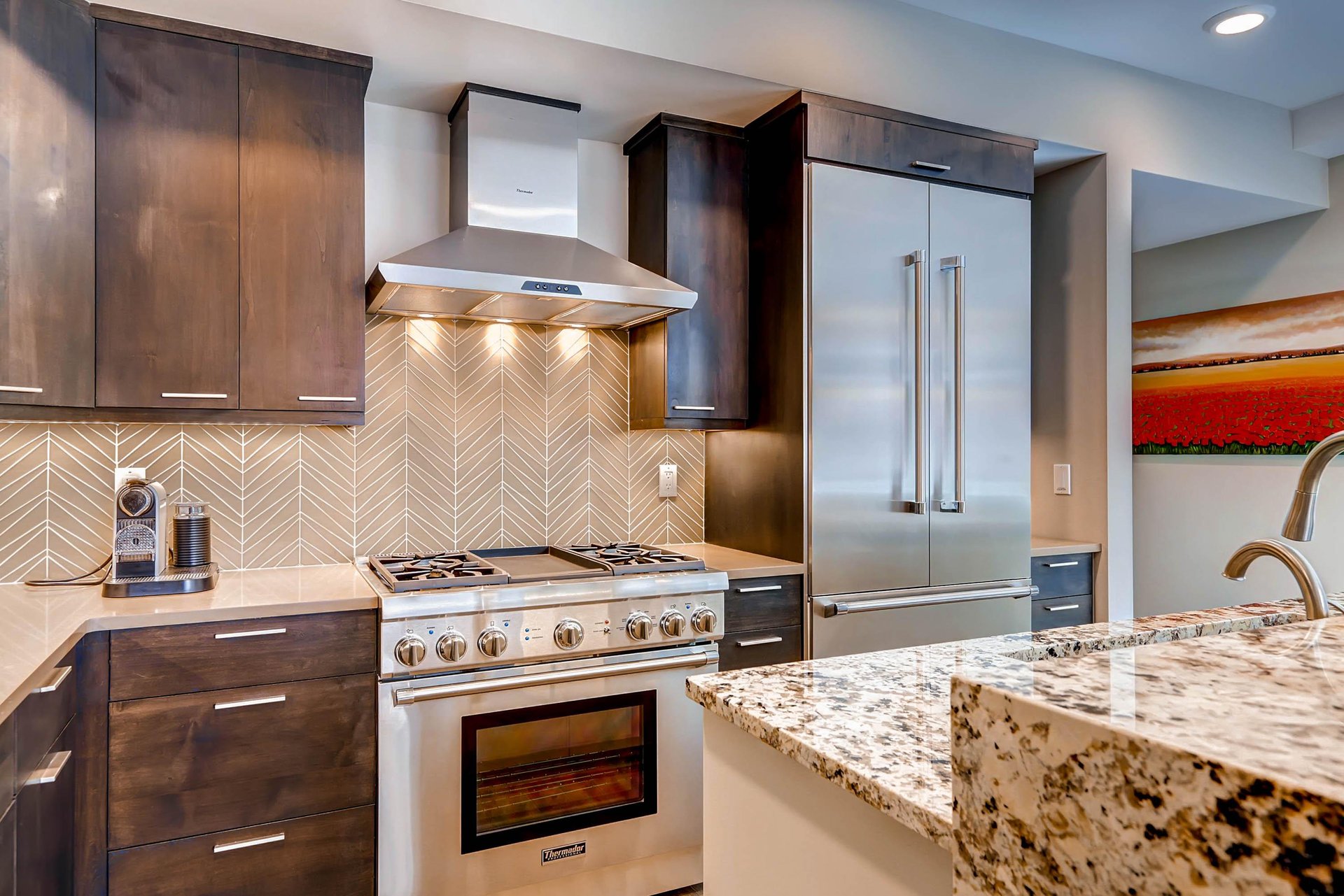 204 has a gourmet kitchen with stainless steel appliances and granite counters.