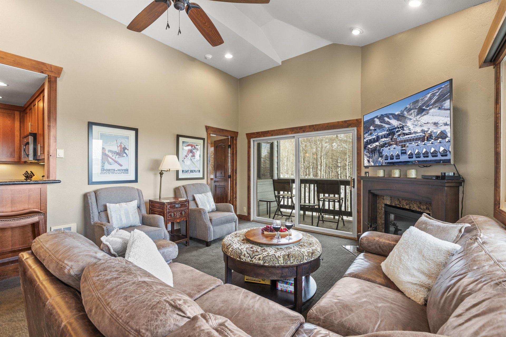 Snow Flower 123 offers a spacious living room with flat screen TV and gas burning fireplace.