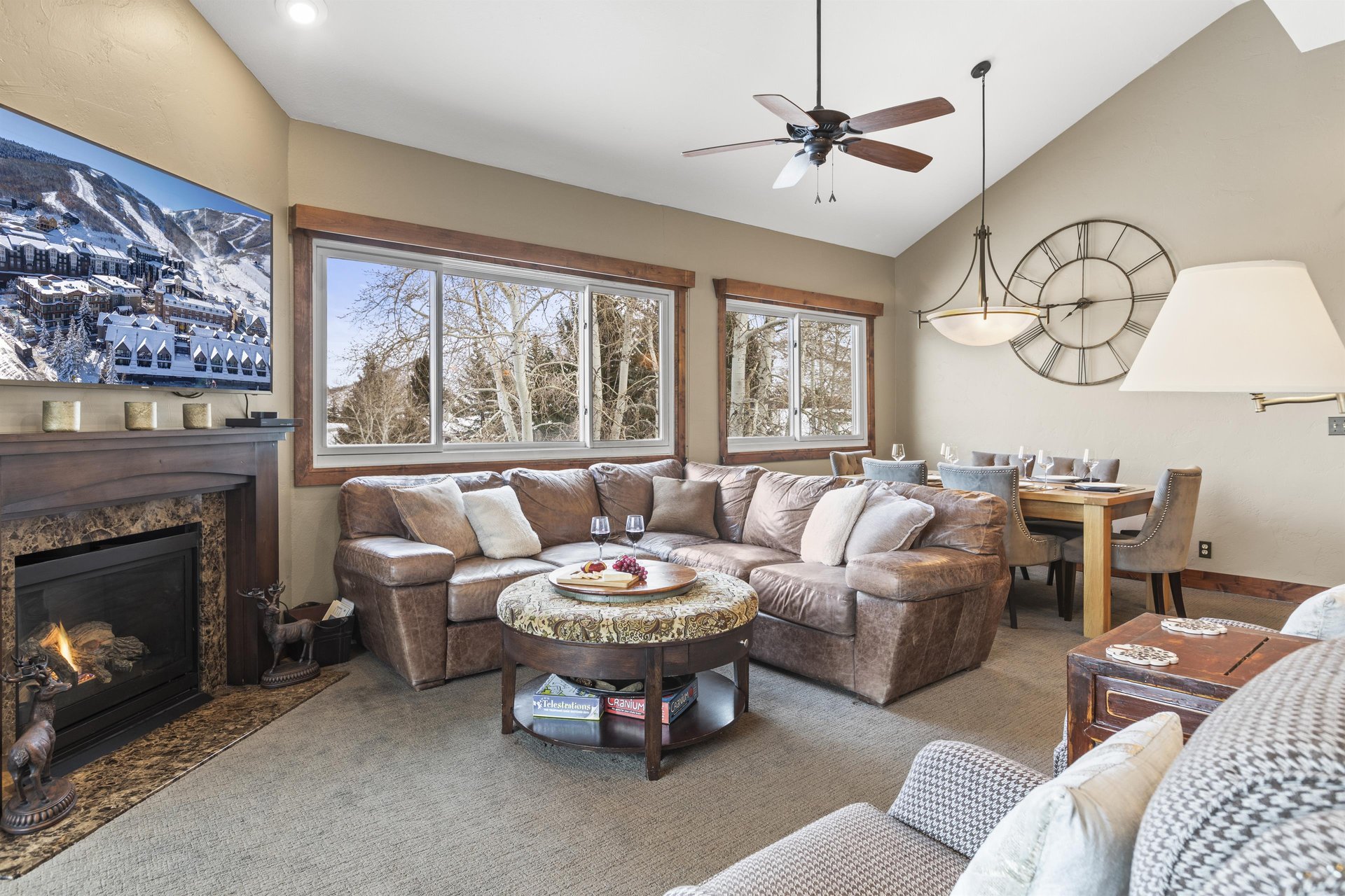 Snow Flower 123 offers a large sectional sofa to relax on next to the fire.