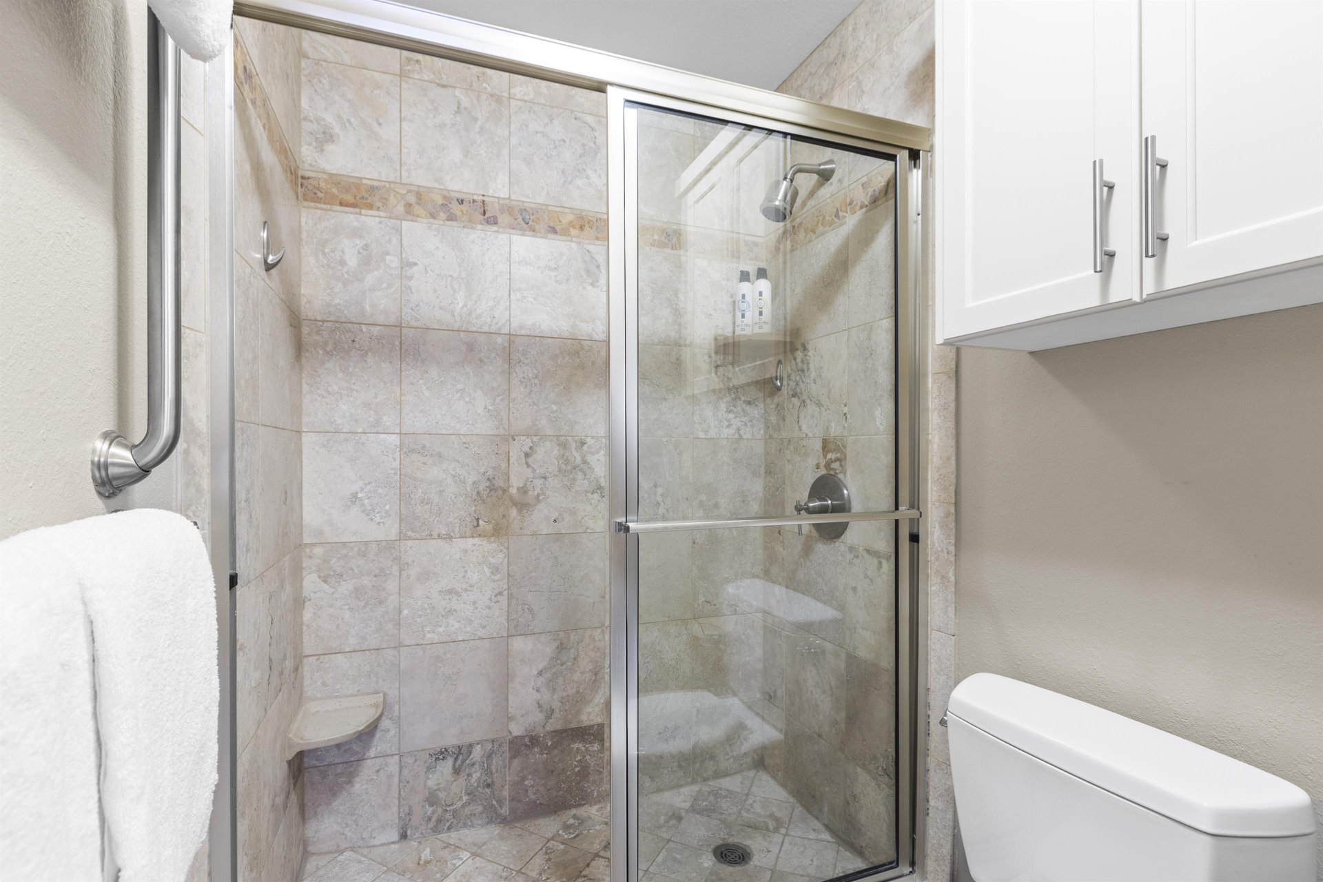 The en suite bathroom has a walkin shower.