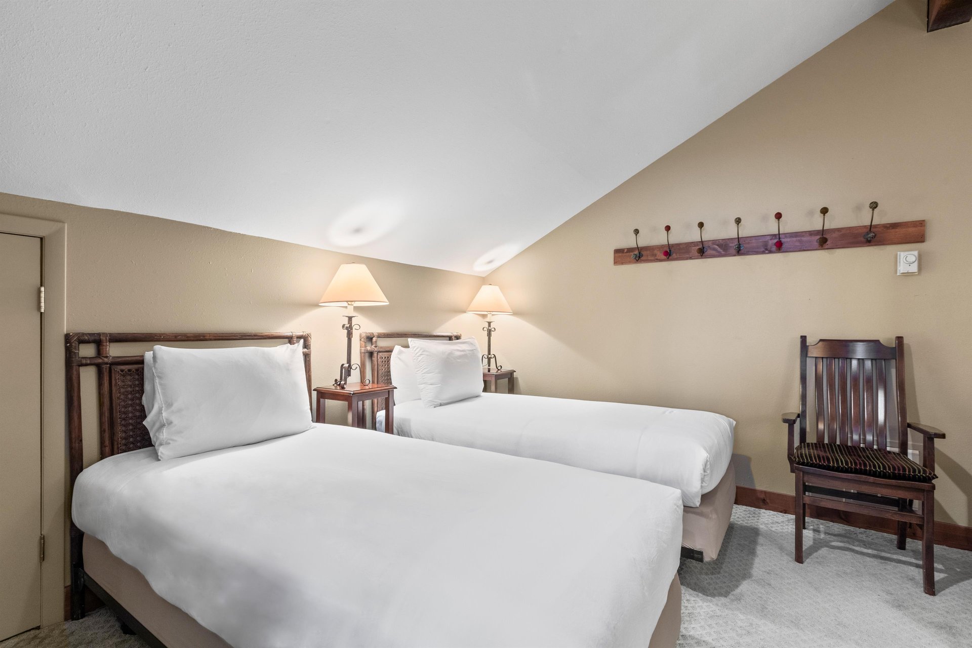 The loft offers two twin beds and coat racks.