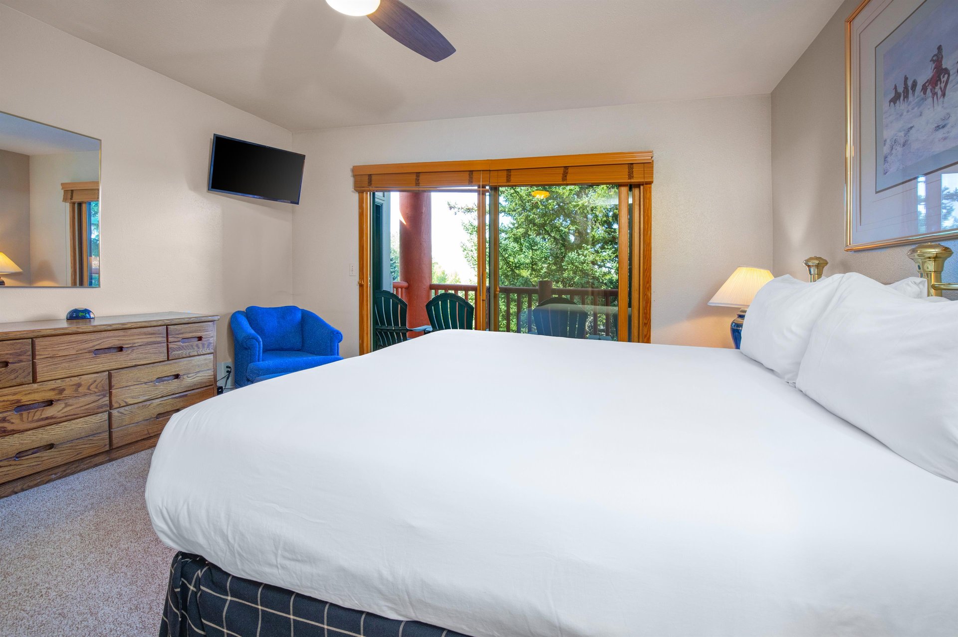 The main suite has a king size bed and private patio access.