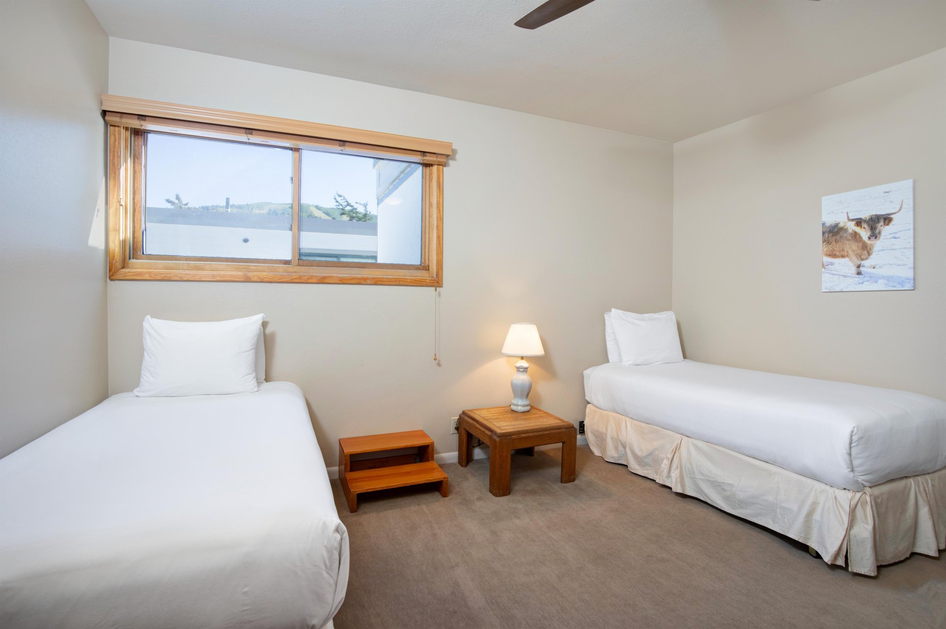 The bedroom, accessed through the loft, has two twin beds.