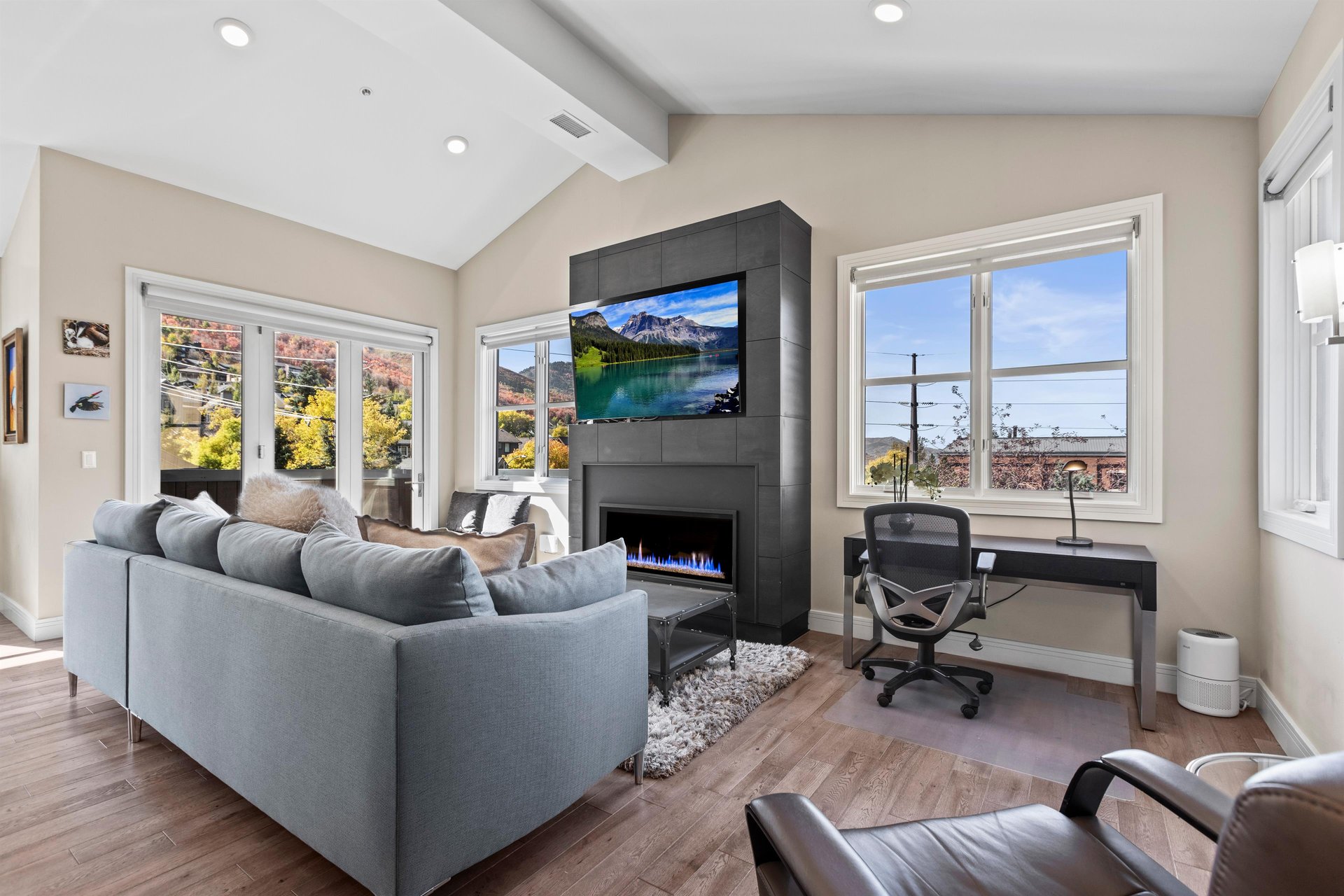 Cozy gas fireplace and large screen TV in the living room