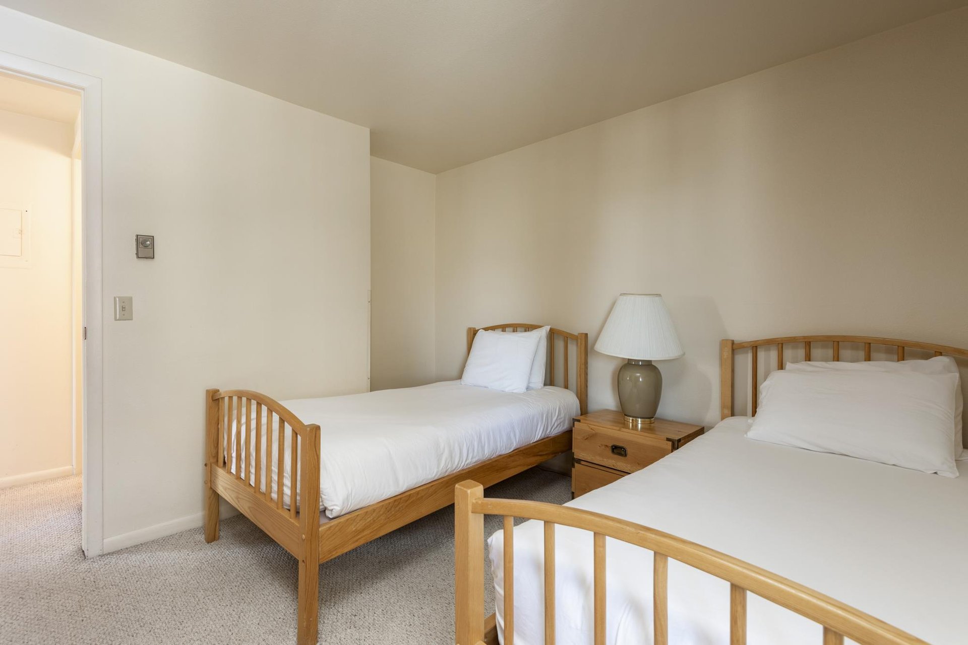 The guest bedroom with two twin beds.