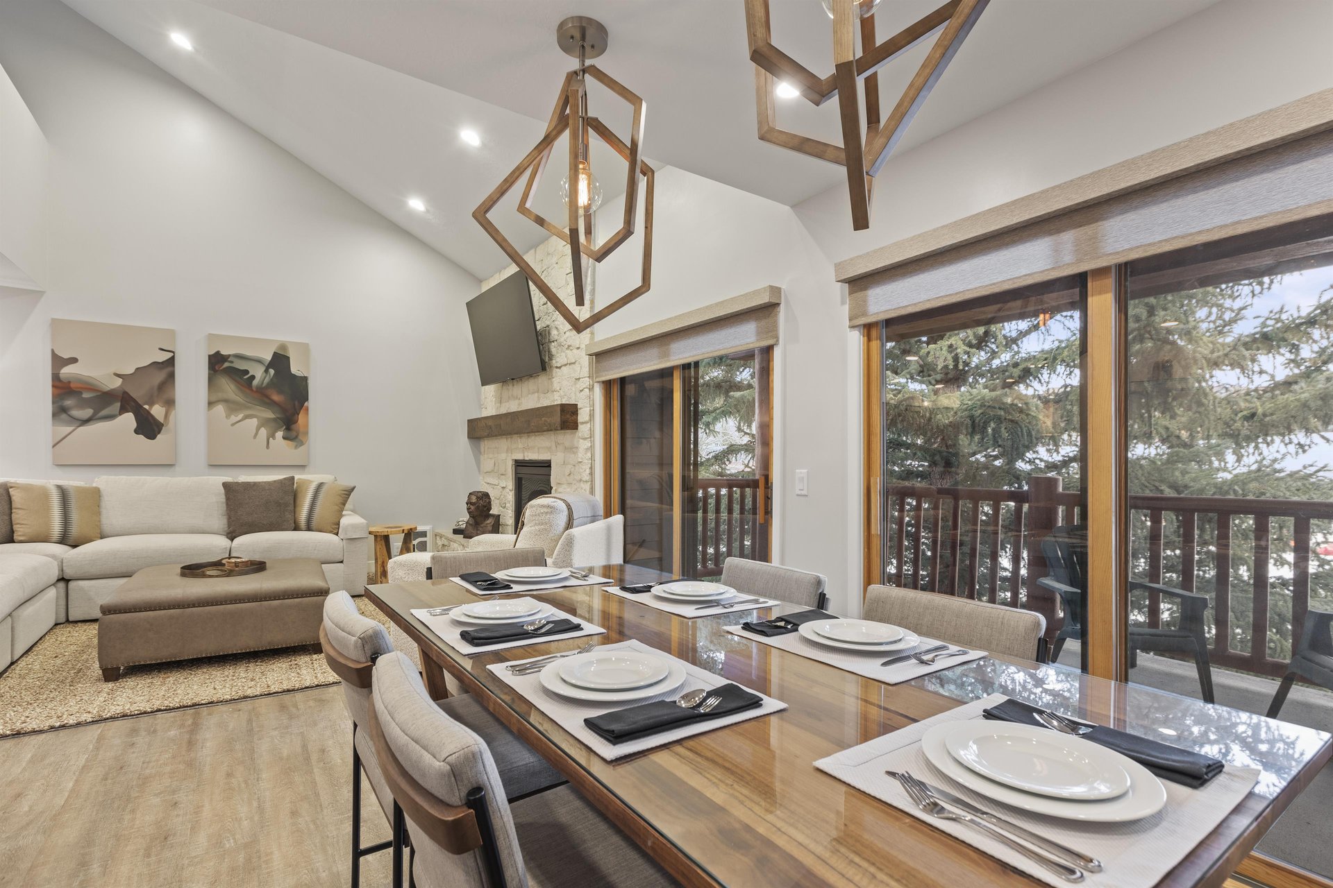 The dining area offers seating for 6 guests and large sliding glass doors next to it.