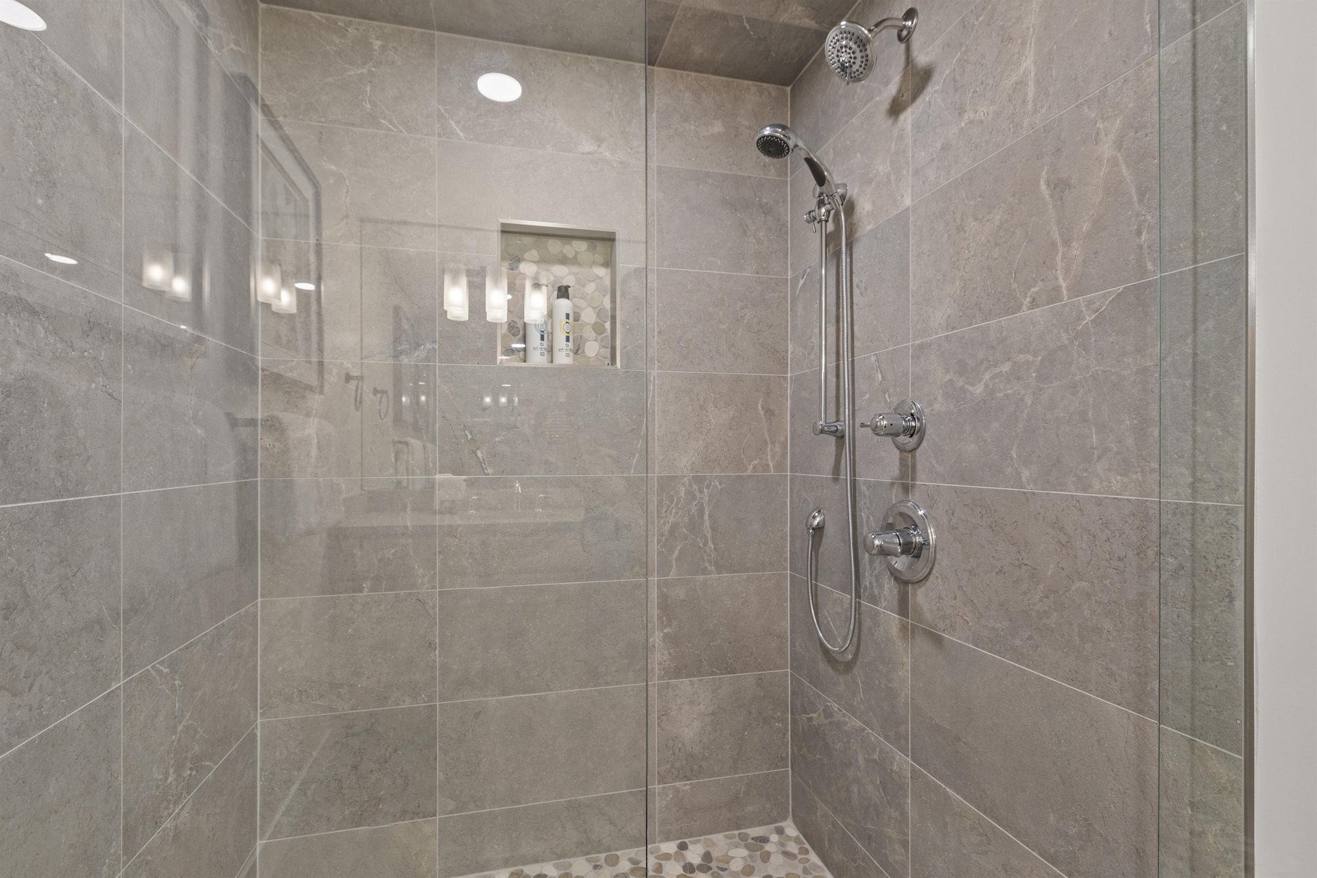 The walkin shower and European glass door.