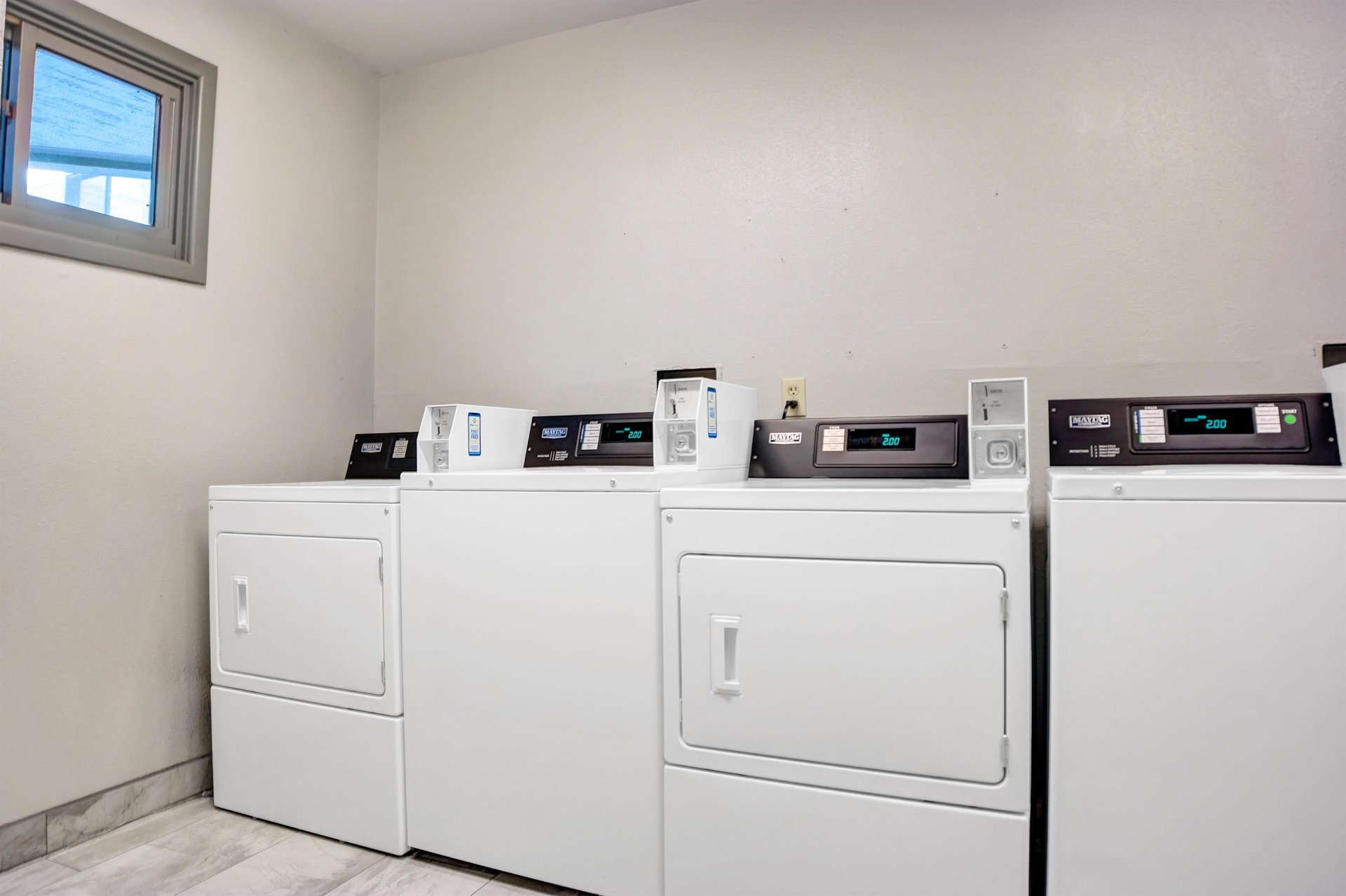 Common laundry room located on the second  third floors. Machines accept both coin payment and credit card via smartphone app