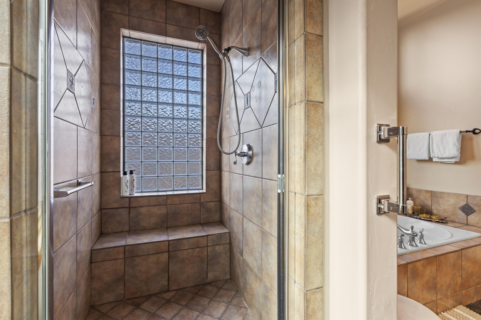 The en suite bathroom with walk in shower.