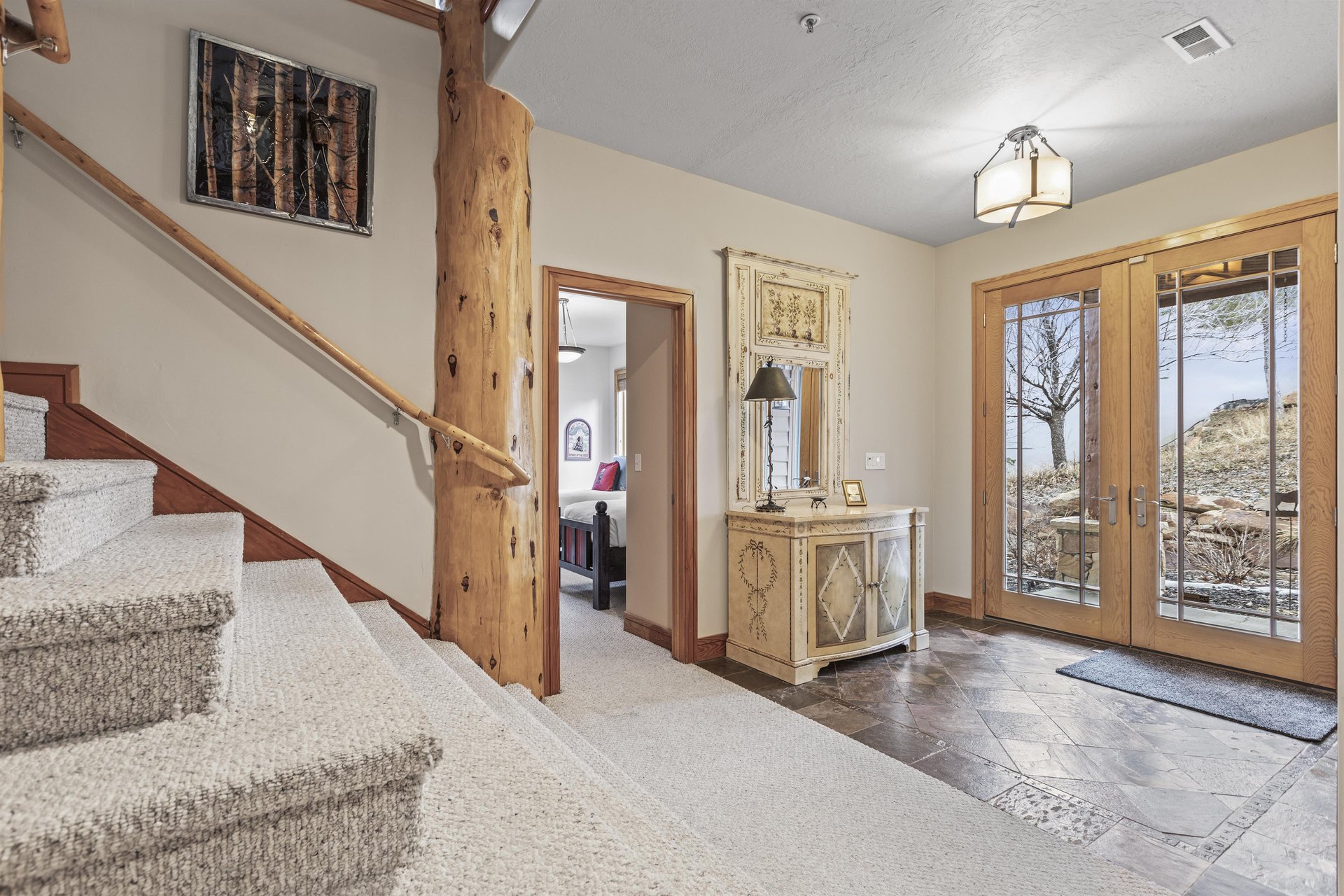 The main entry way with grand staircase.