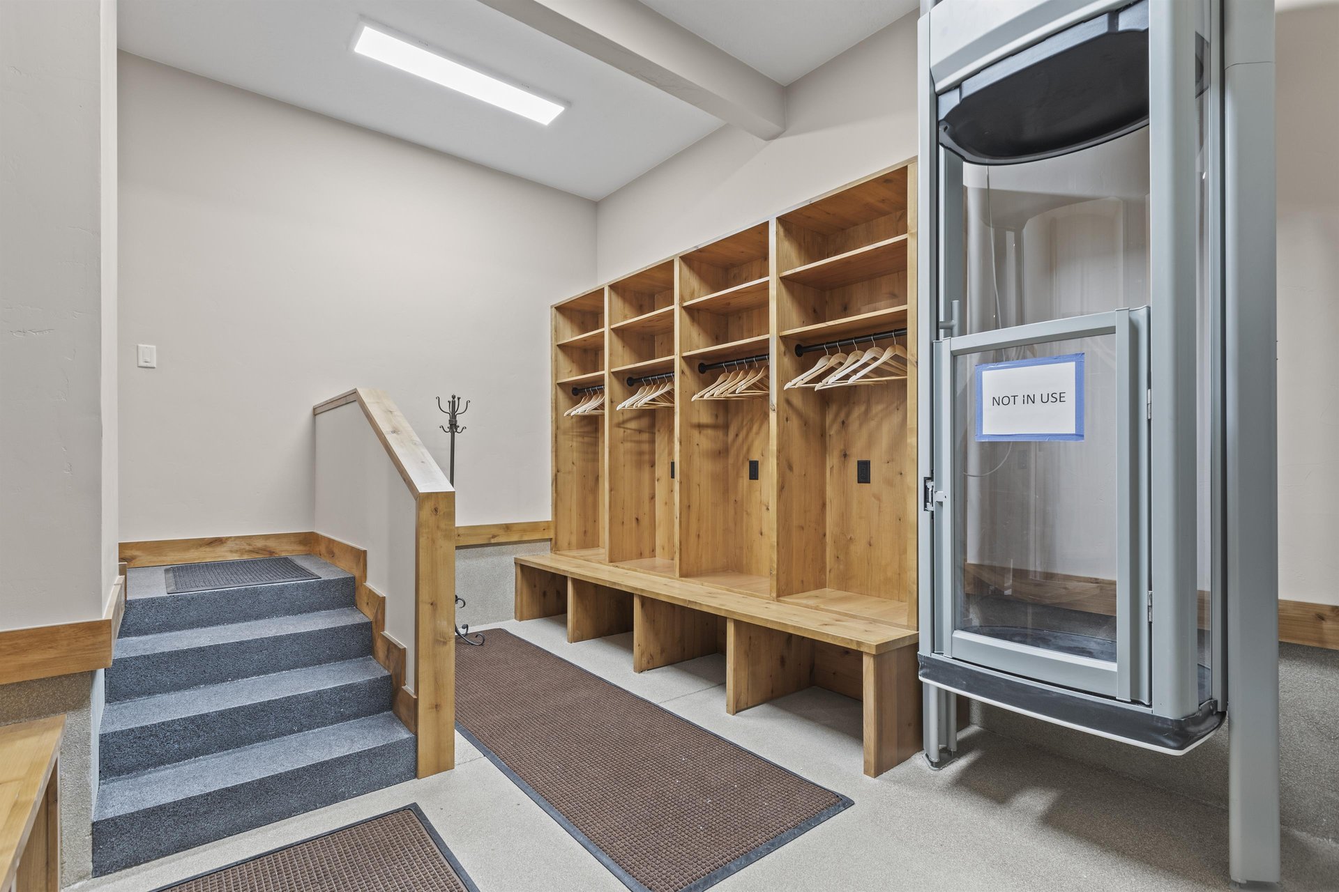 The mud room accessed through the garage with ski gear storage.