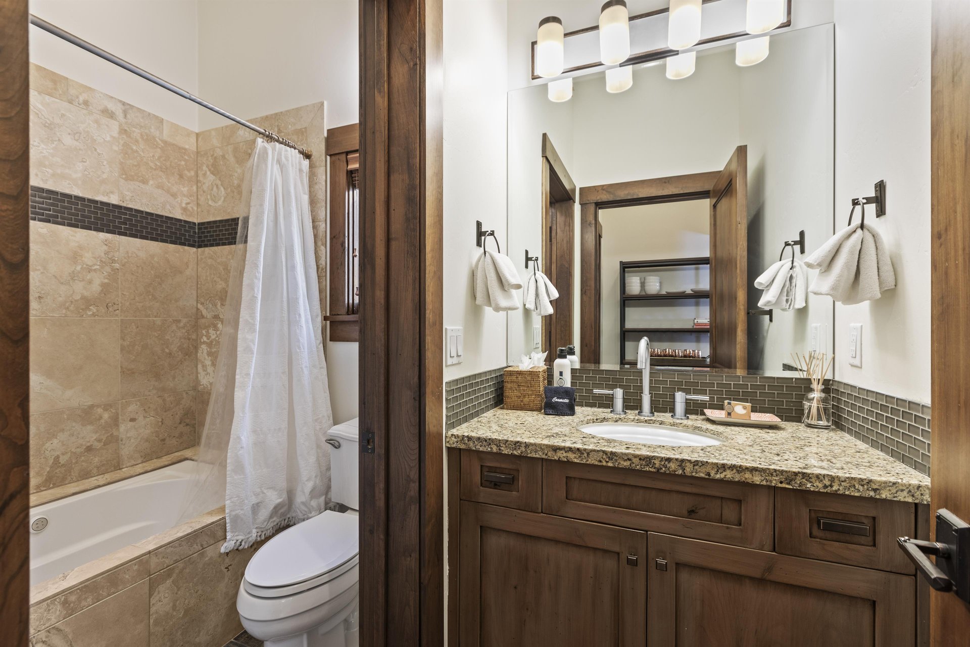 Town Lift Chalet has a shared bathroom on the main level of the floor with a separate water closet and tubshower combo.