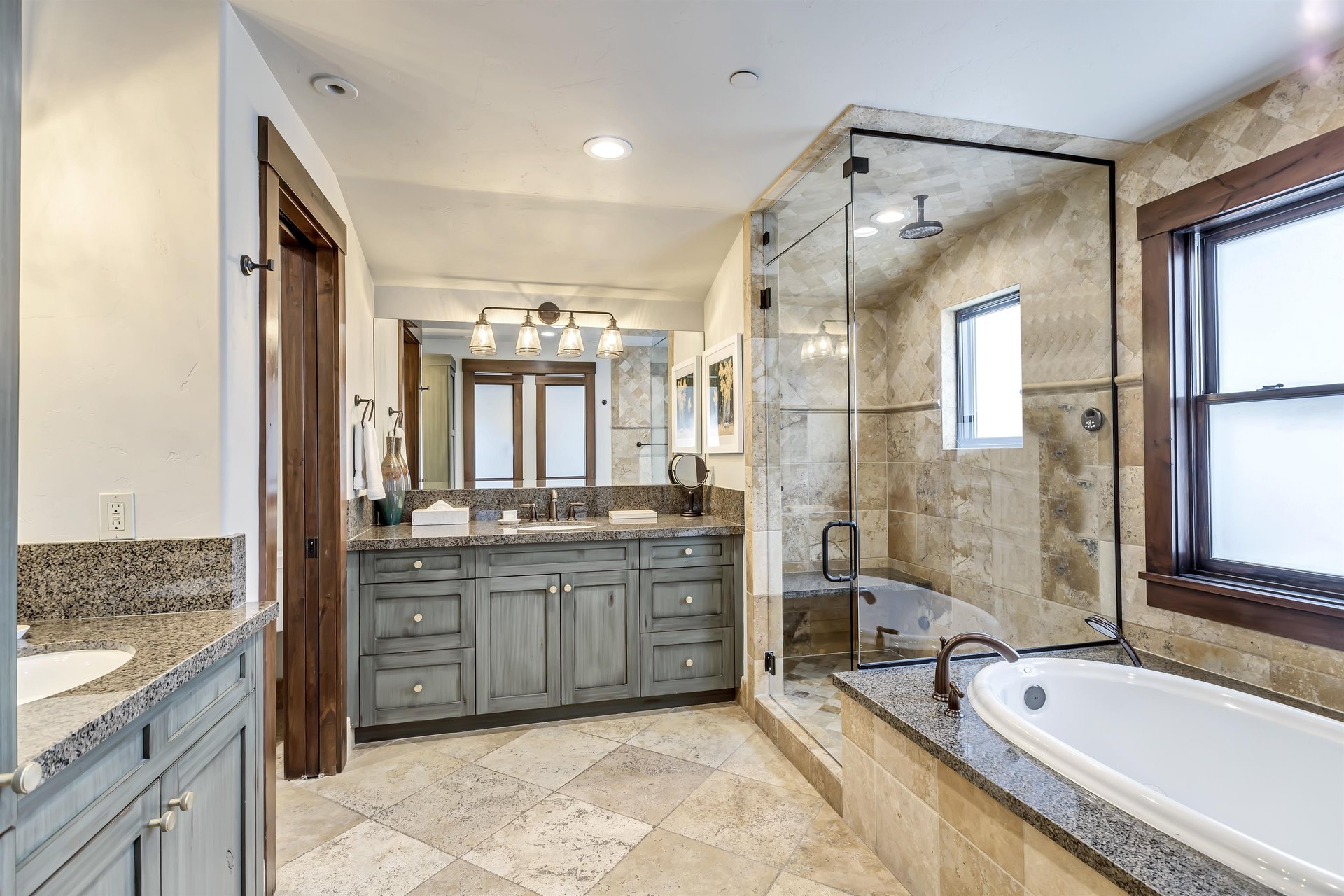 Ensuite full main bath with sunken tub  glass encased rainfall shower