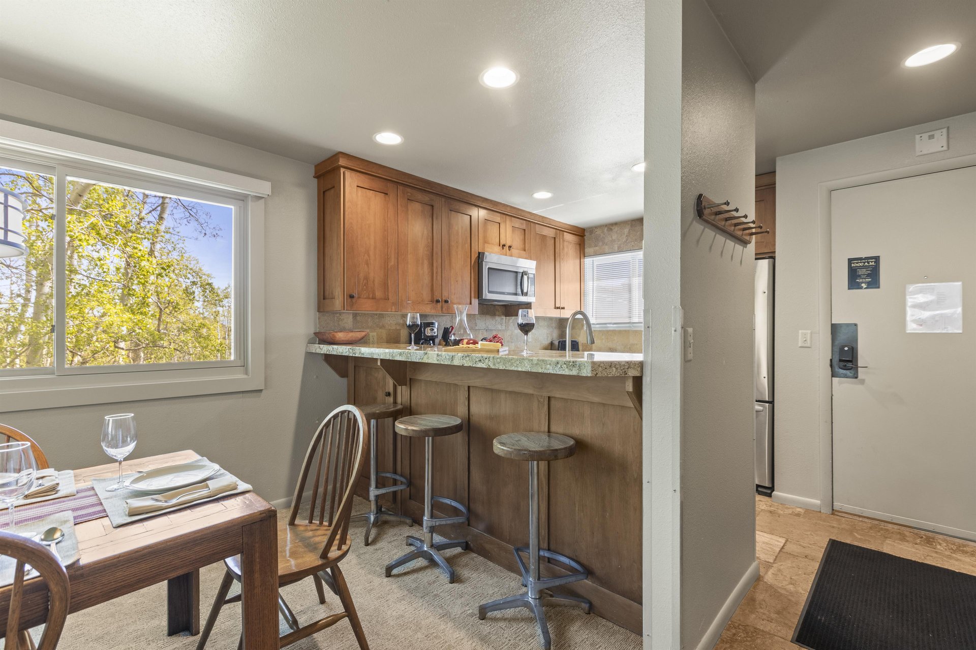 The breakfast bar offers seating for 3 guests.