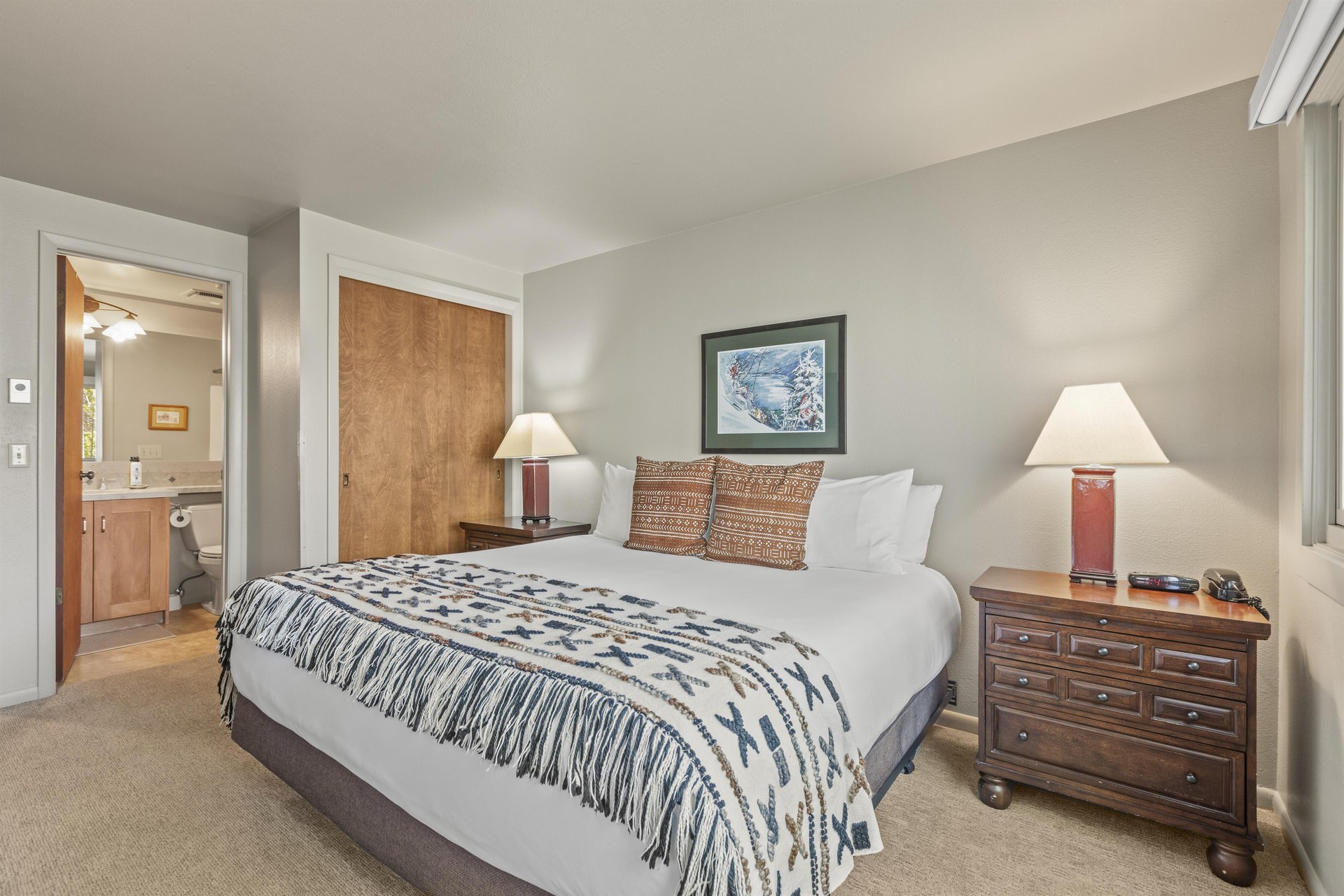 The main suite has a king size bed and comfortable furnishings.
