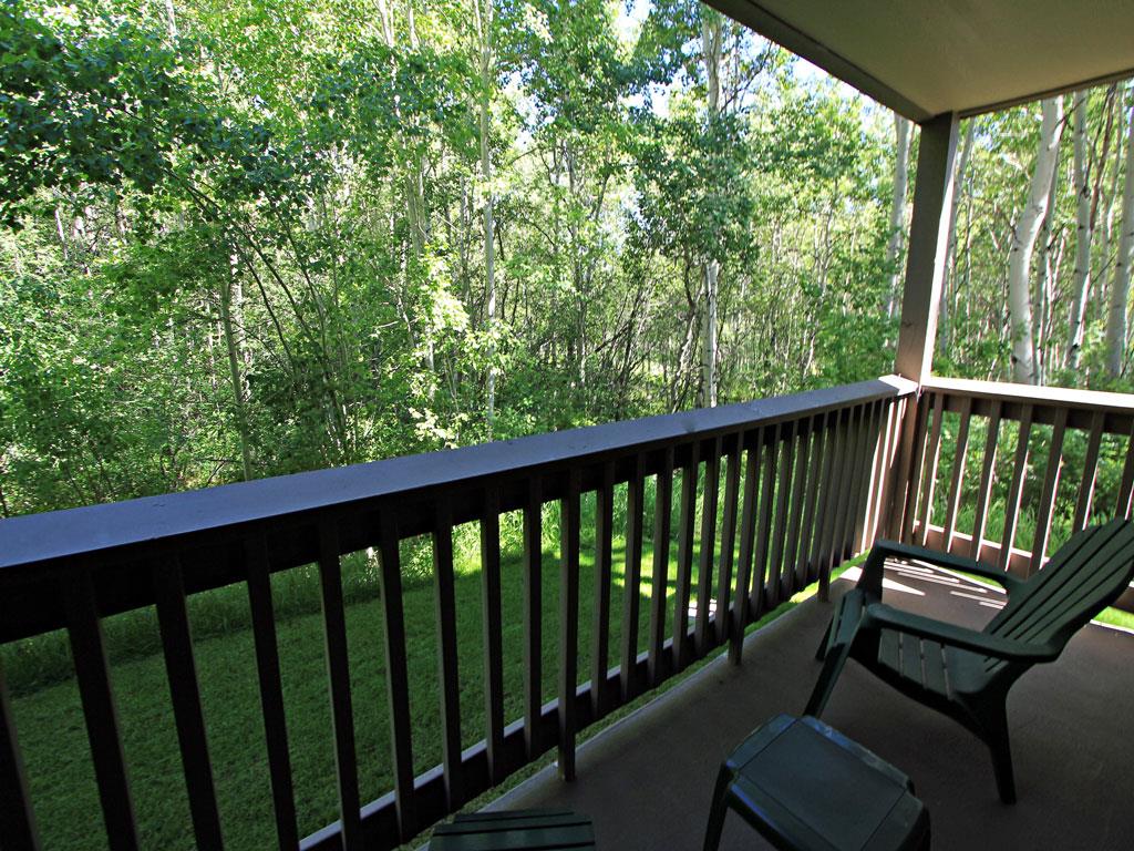 Private patio with views of the beautiful grove of green Aspen trees