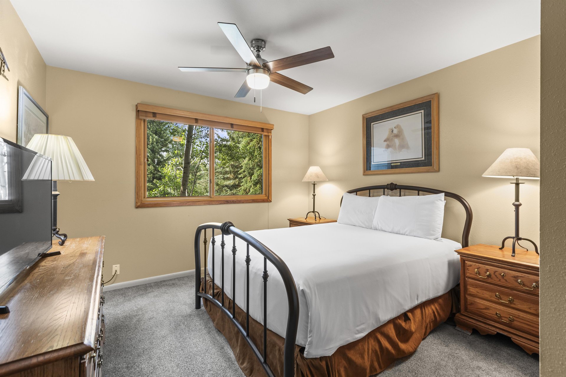 The third bedroom has a queen size bed.