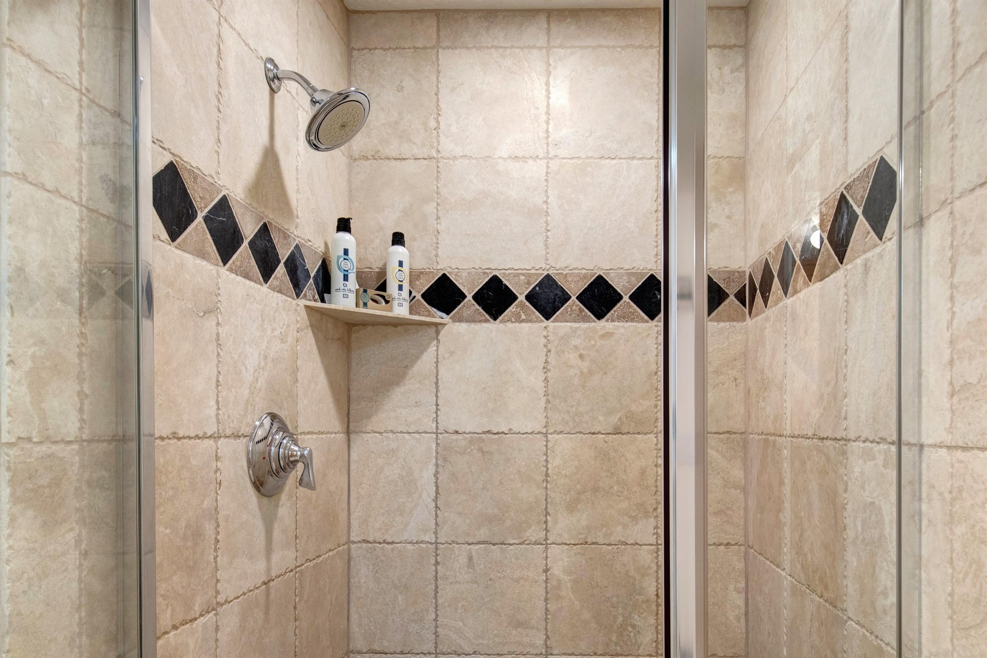 The en suite bathroom offers a walkin shower.