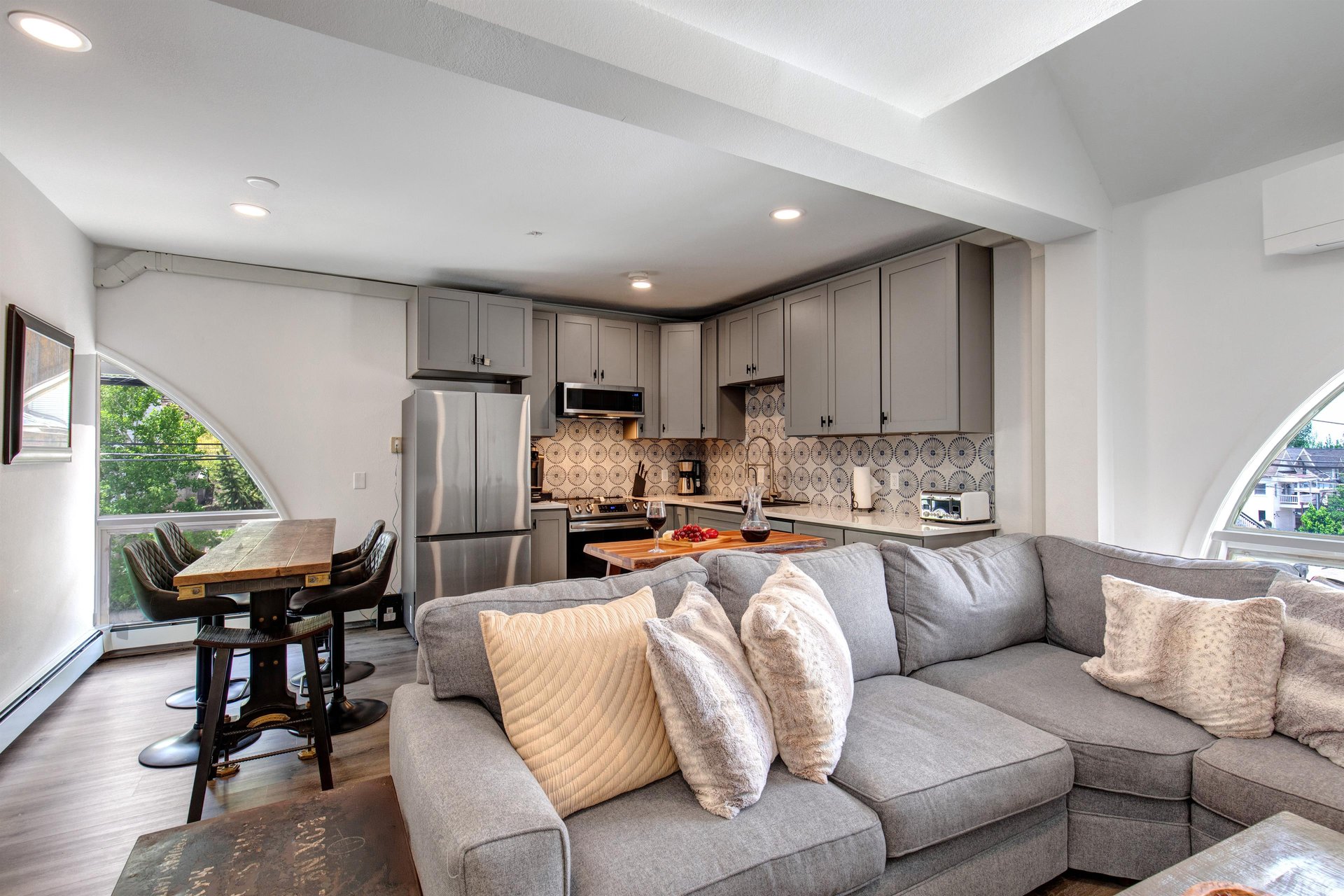 The open concept floor plan  kitchen, dining area, and living area.