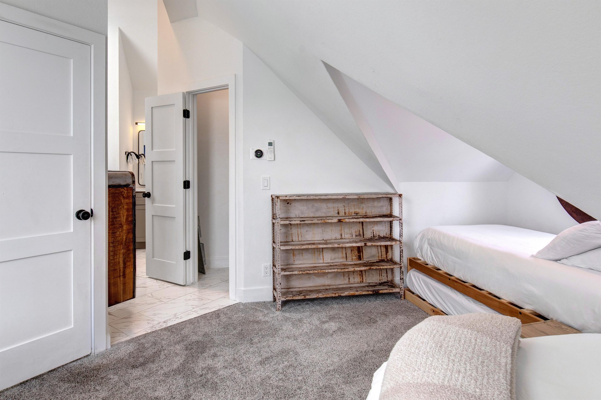 The second bedroom with two twin beds and twin trundles.