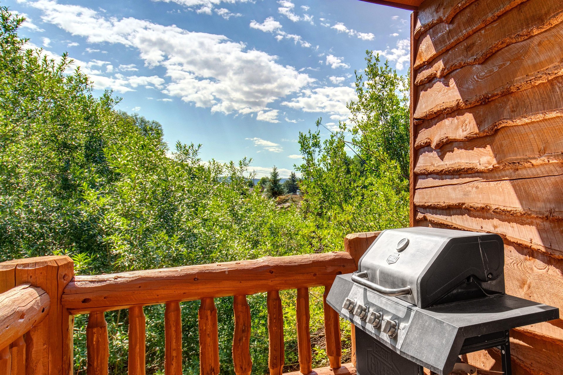 The private balcony with a BBQ gas grill.