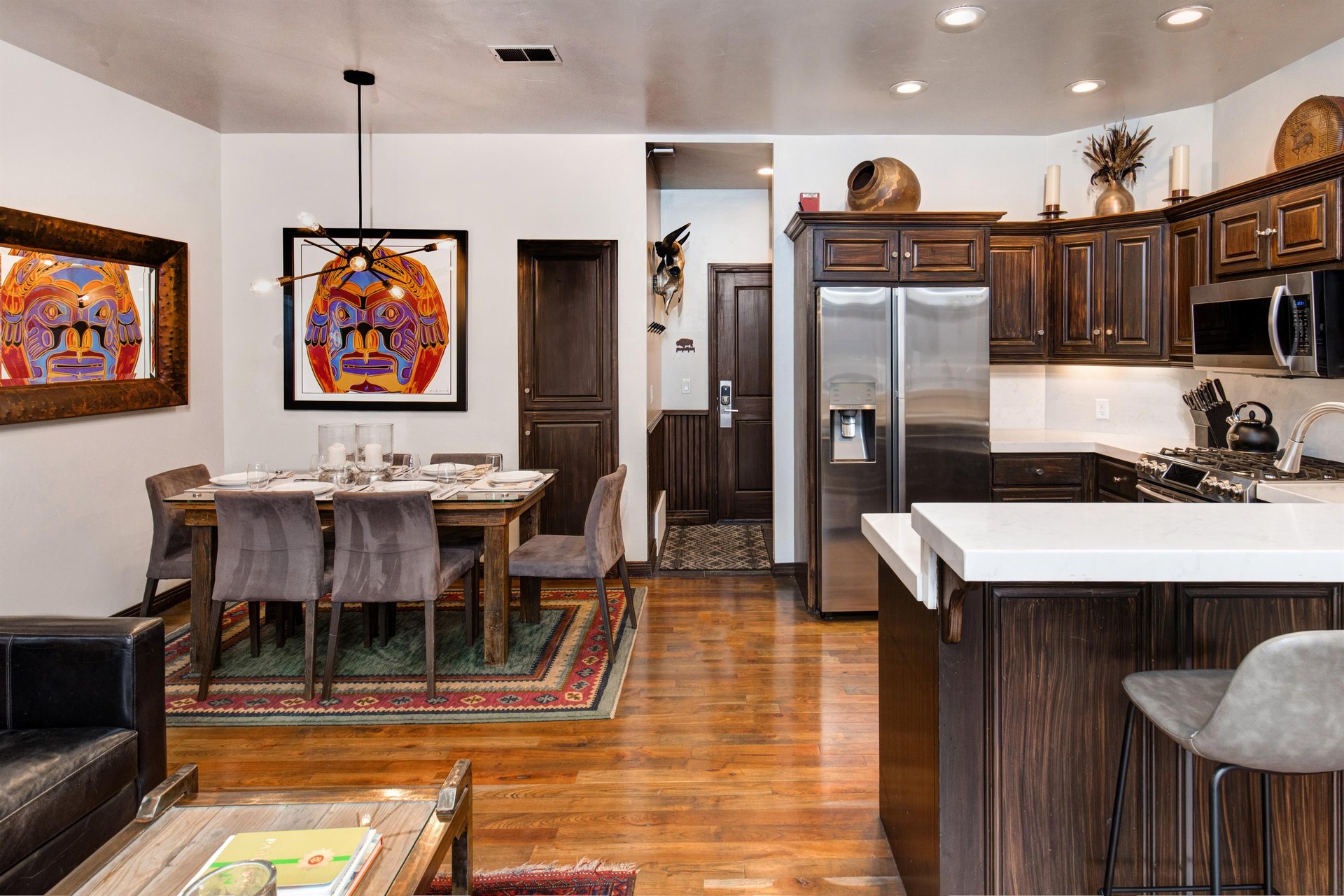The open concept living, dining, and kitchen area.
