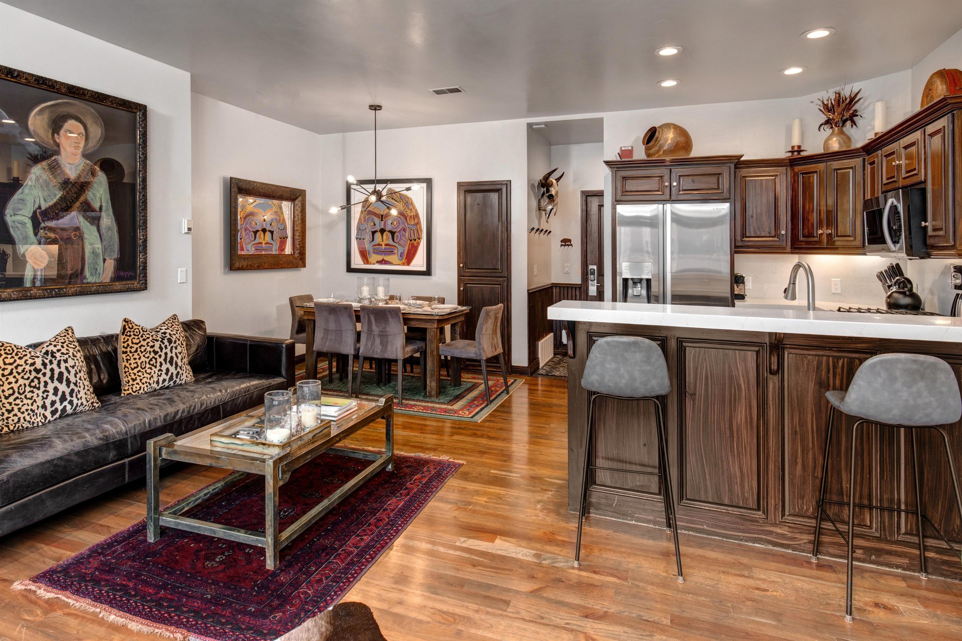 The open concept living, dining, and kitchen area.