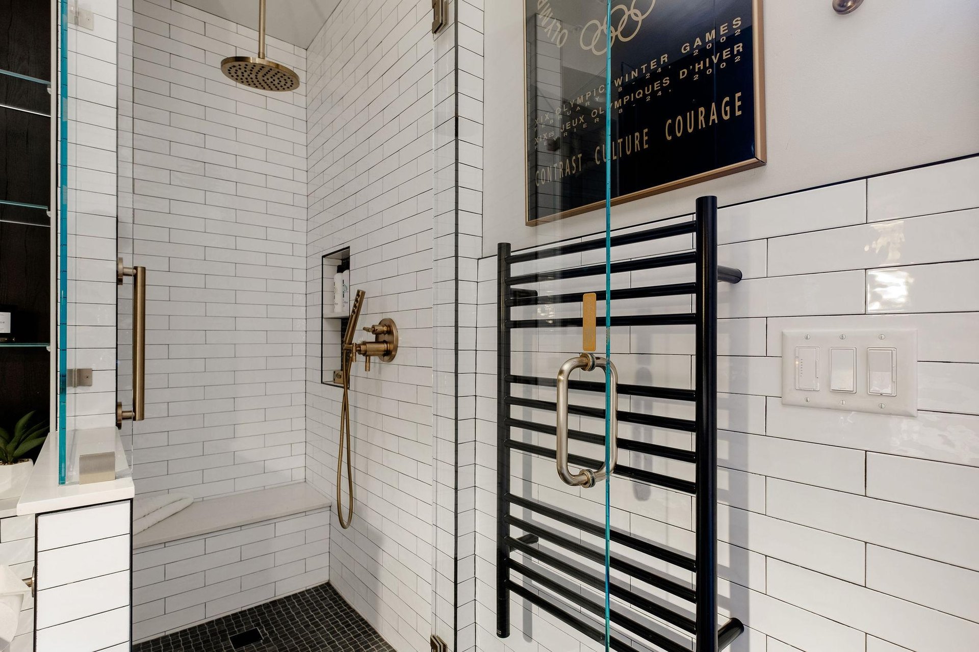 The en suite walk in shower with rain shower head.