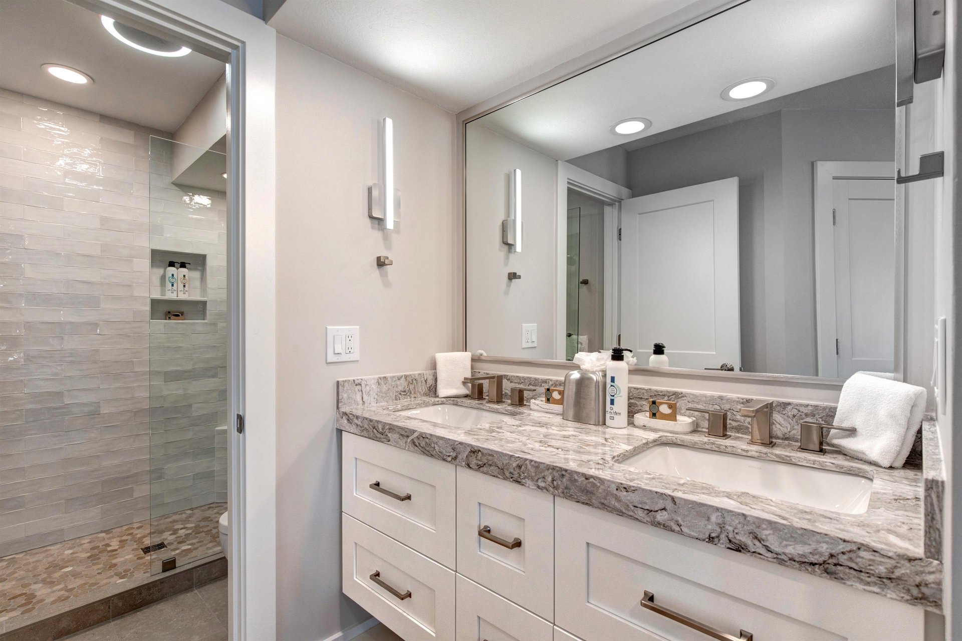 The en suite bathroom is bright and inviting.