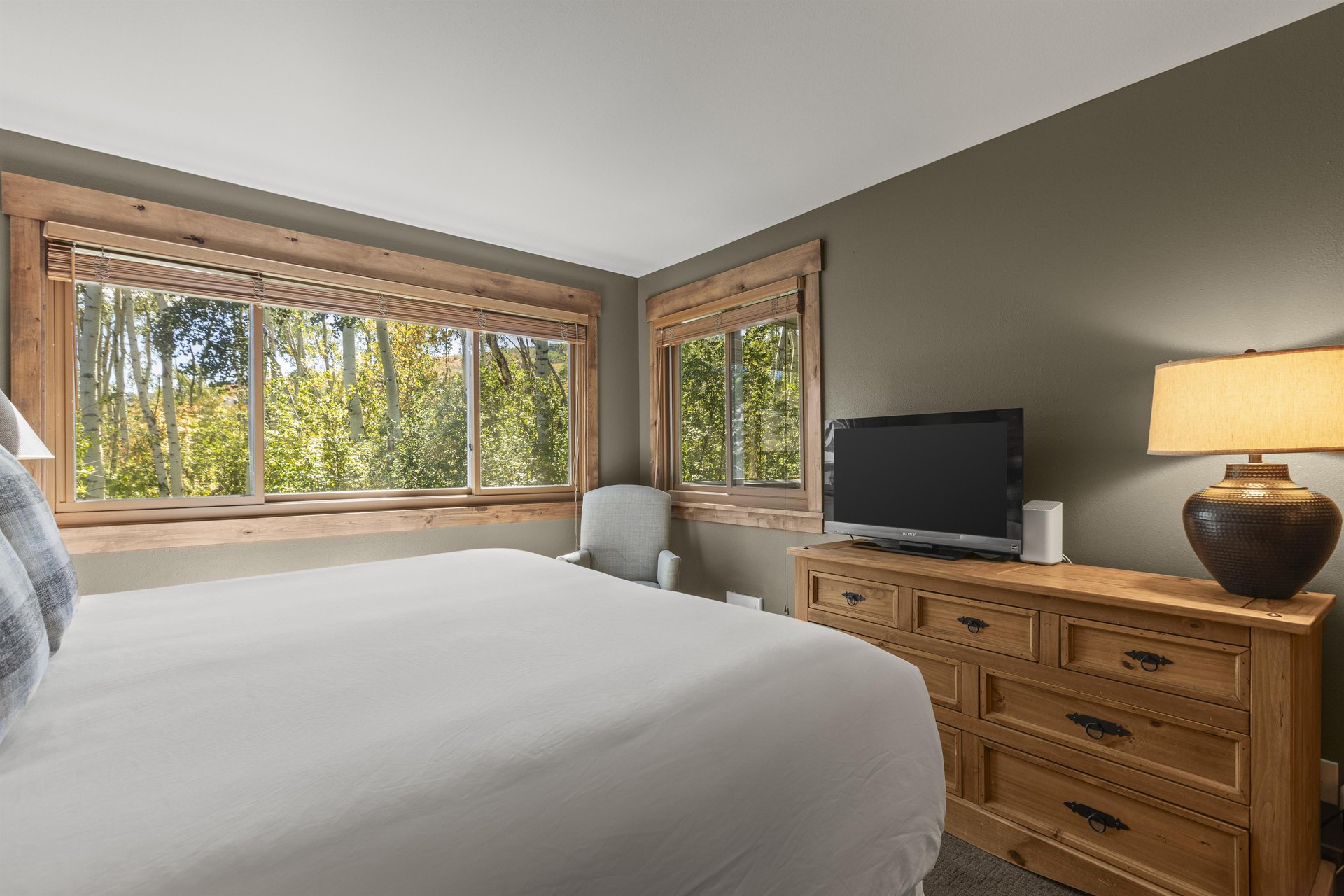 The main suite has a kingsize bed and a flat screen TV.
