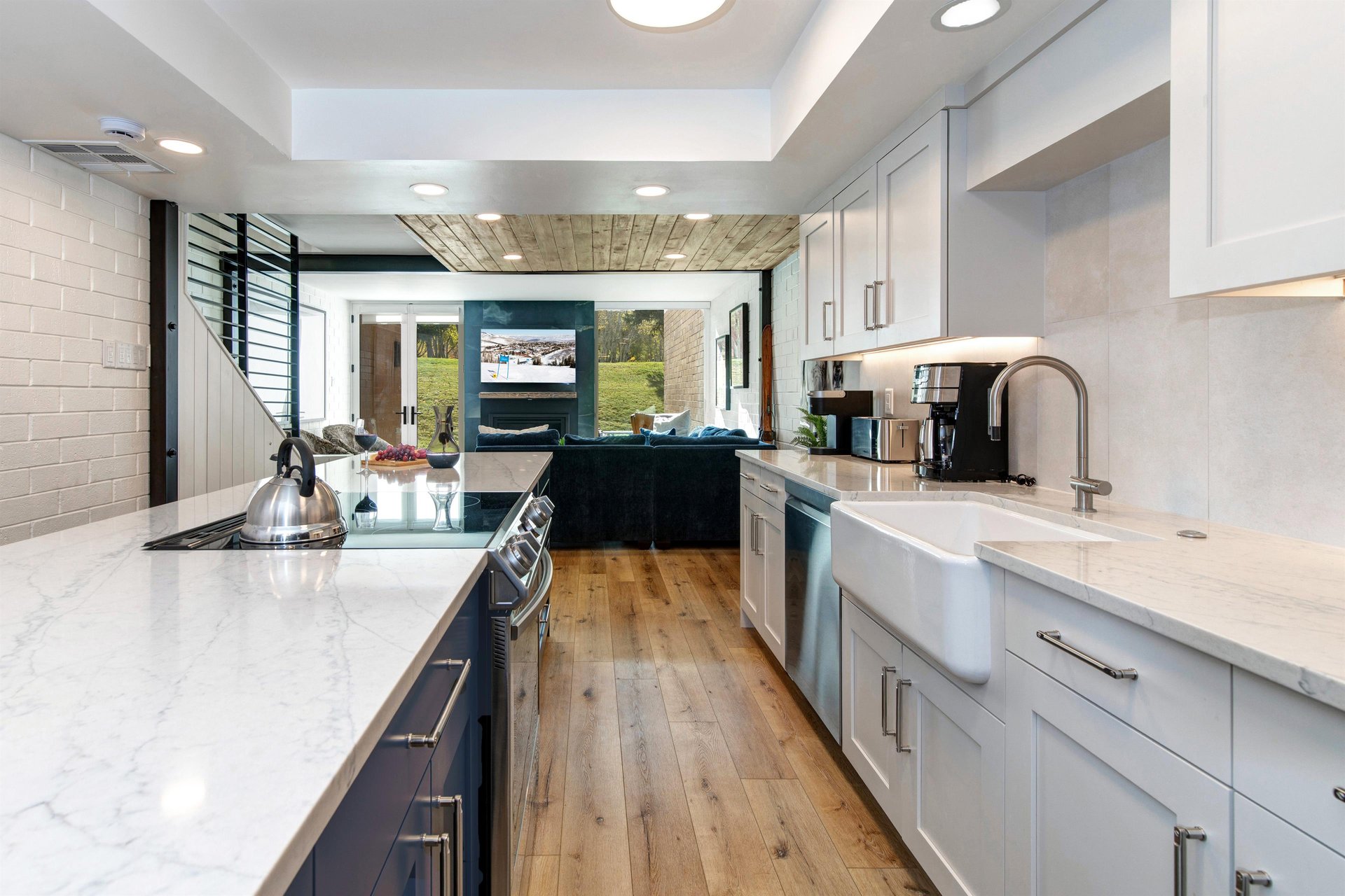The spacious galley kitchen in the middle of the open concept living area.