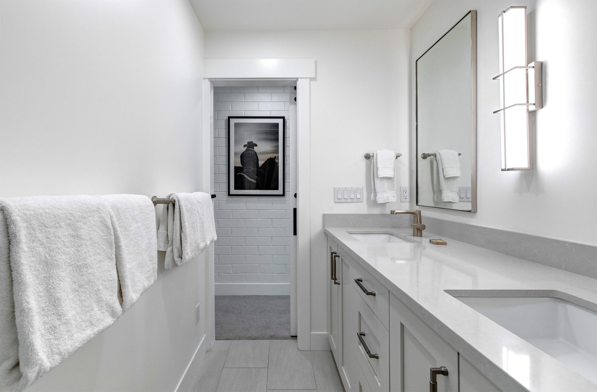 The en suite bathroom with two sink vanity.