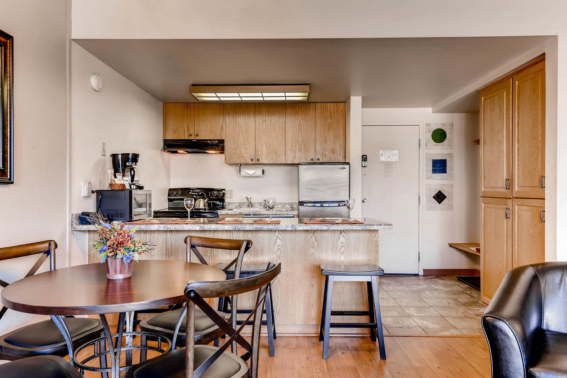 The dining area with seating for 4 guests.