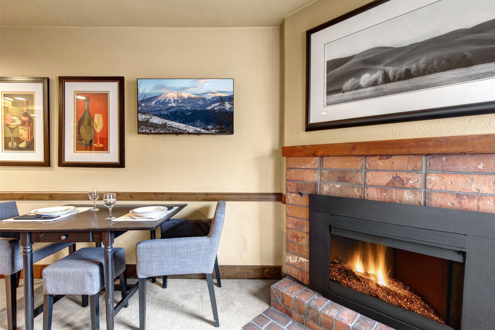 Cozy up to the crackling fireplace while you dine at your private table for two.