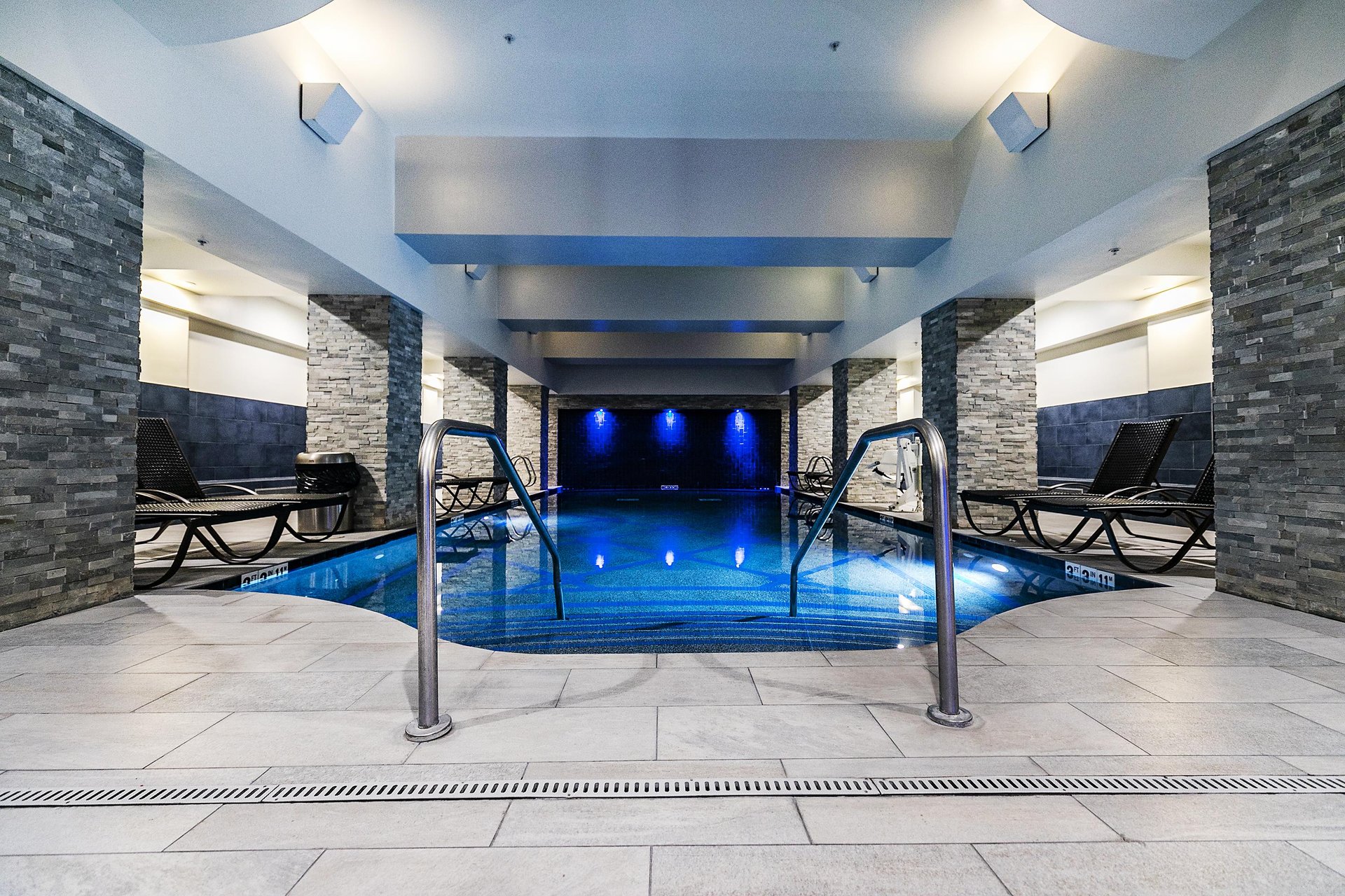 Adult relaxation pool, indoor pol sapphire blue lighting