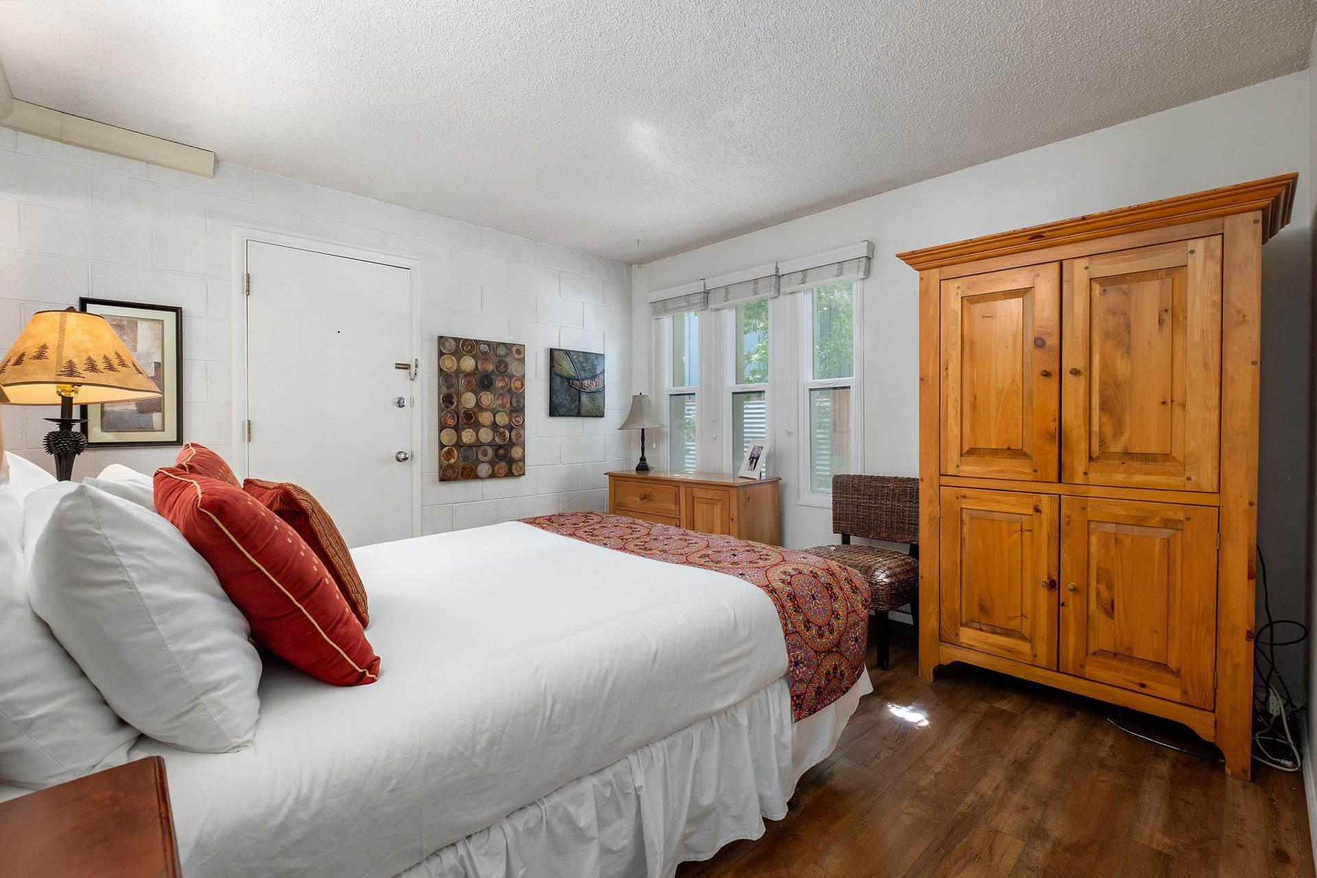 Comfortable queen bed in the main bedroom