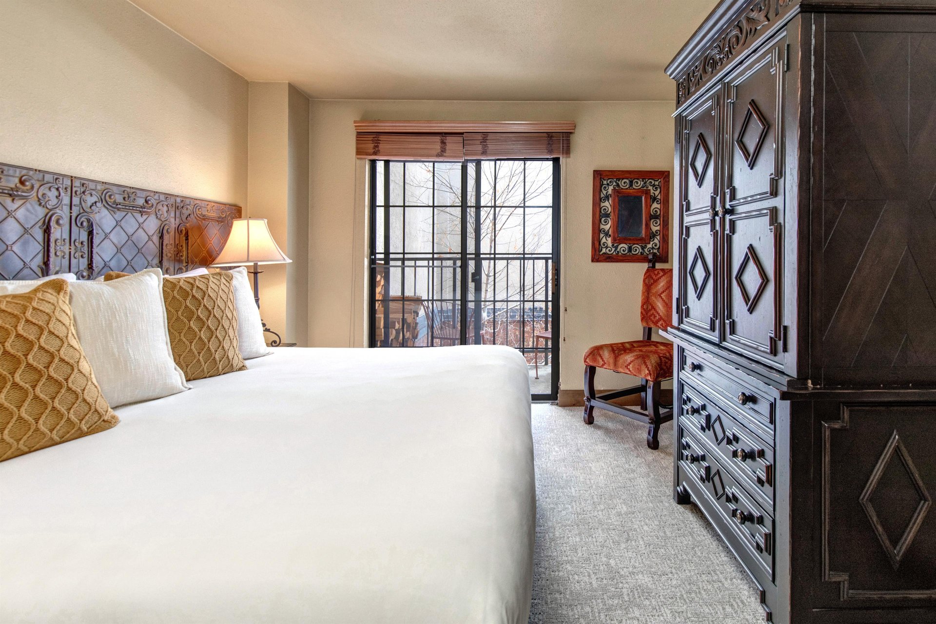 Sink into crisp white linens and plush pillows in your elegantly appointed bedroom.
