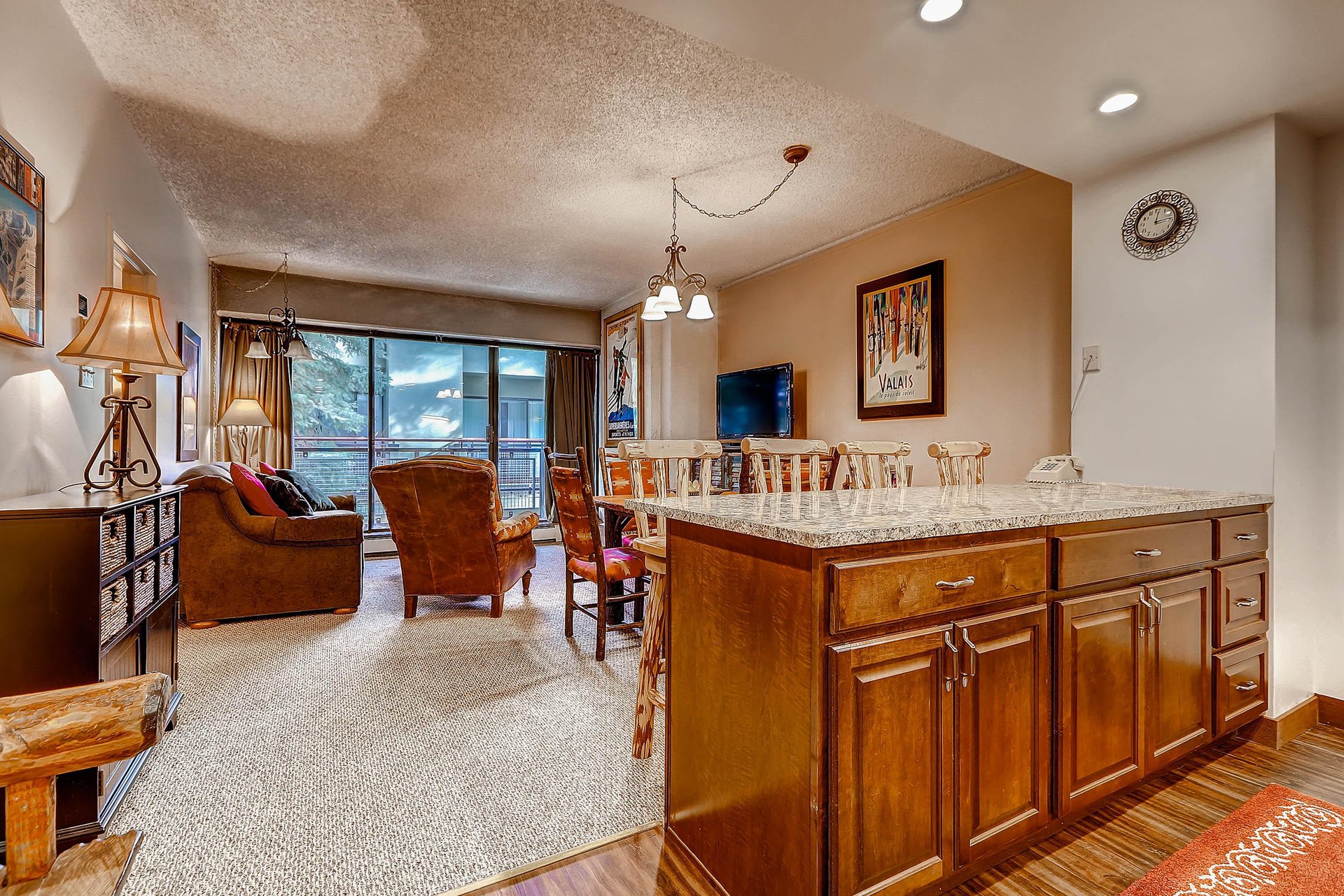 The kitchen with a breakfast bar with seating for 4.