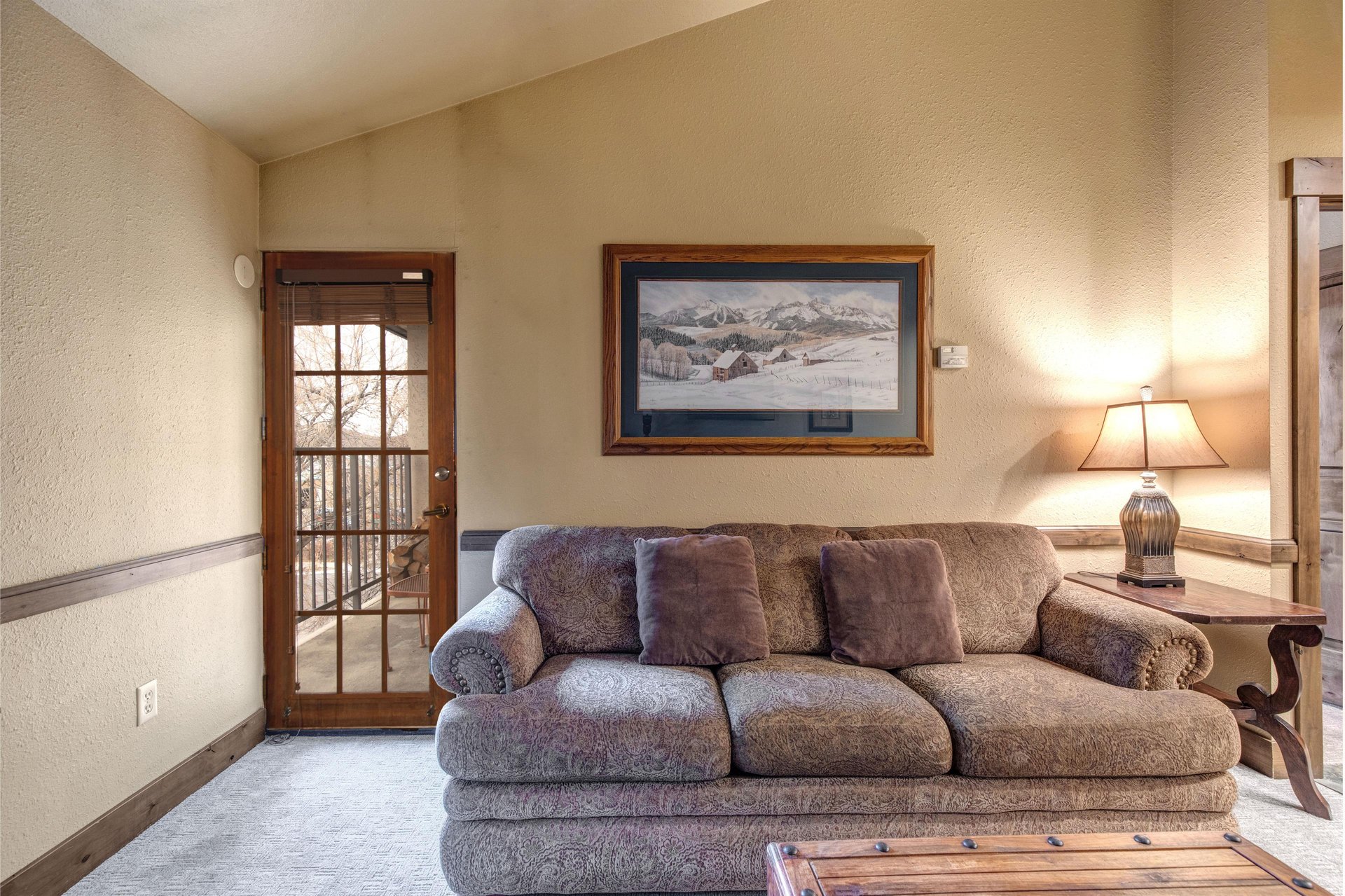 Sink into this plush sofa and feel the days stress melt away in your cozy mountain retreat.