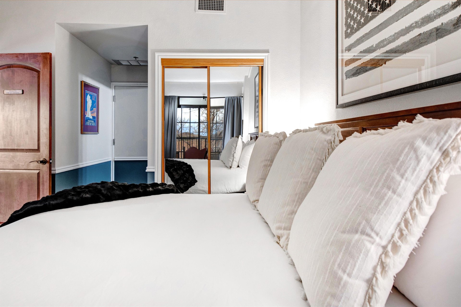 Sink into plush white linens on a kingsize bed.